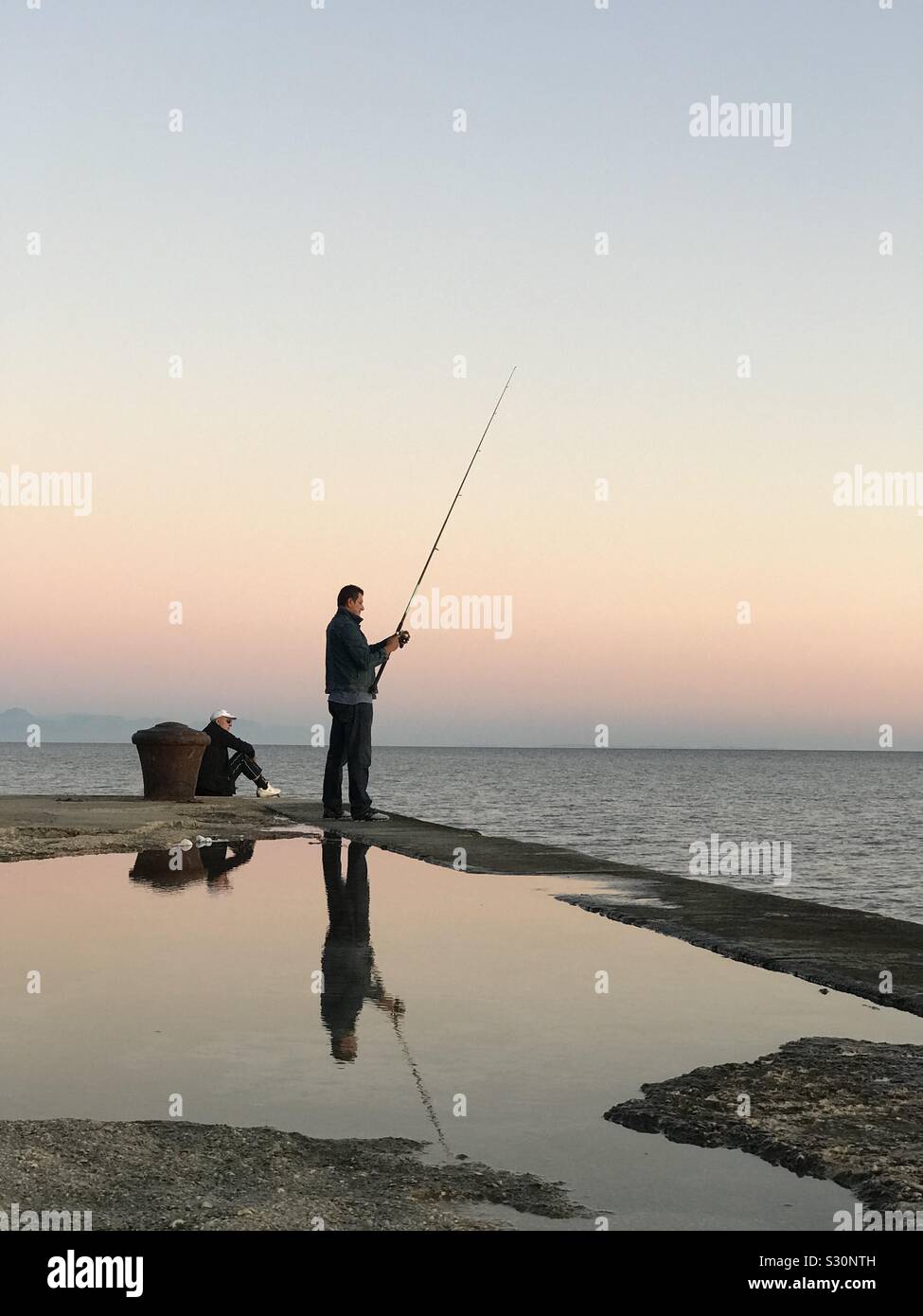 Fishing reflection Stock Photo