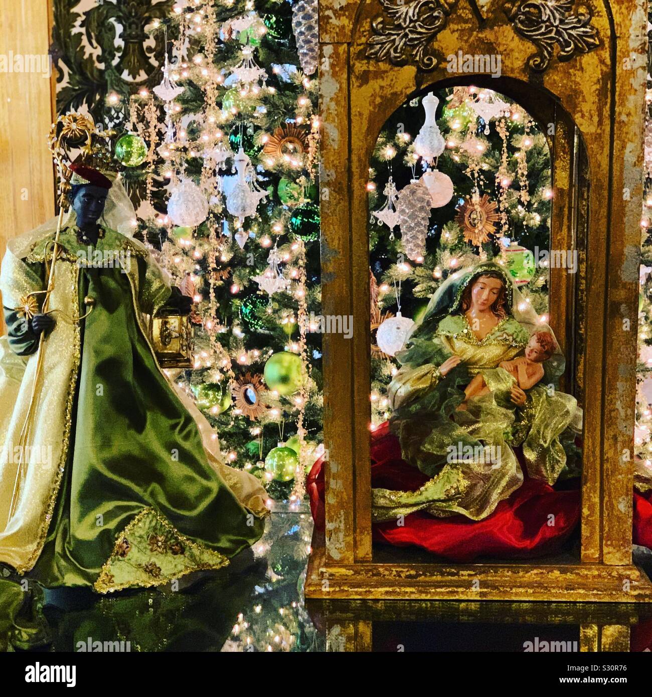 Crèche amidst the opulent interior of Marble House during the Christmas season, Newport, Rhode Island, United States - Smartphone Captured Stock Image