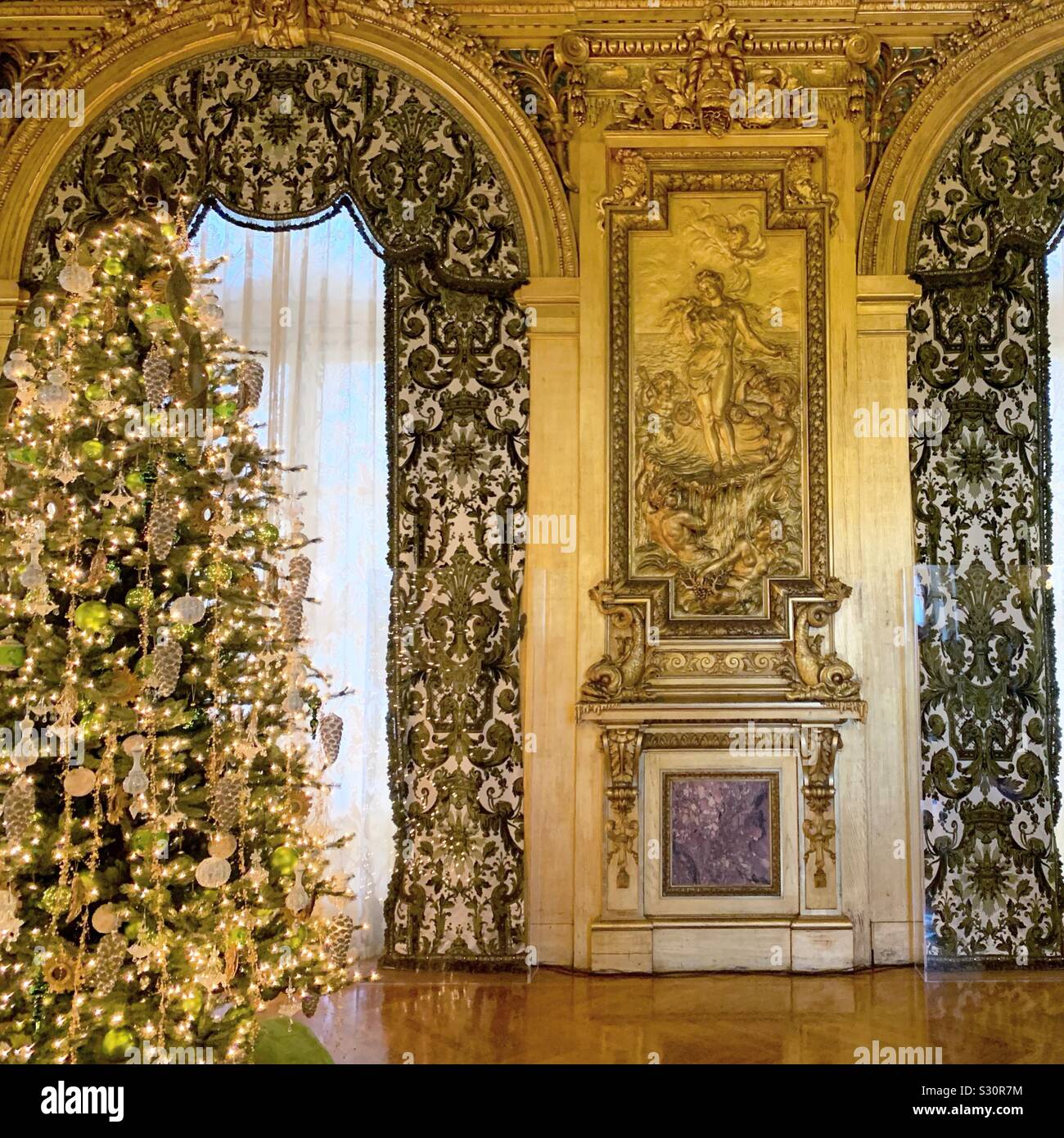 A Christmas amidst the opulent interior of Marble House in December, Newport, Rhode Island, United States - Smartphone Captured Stock Image