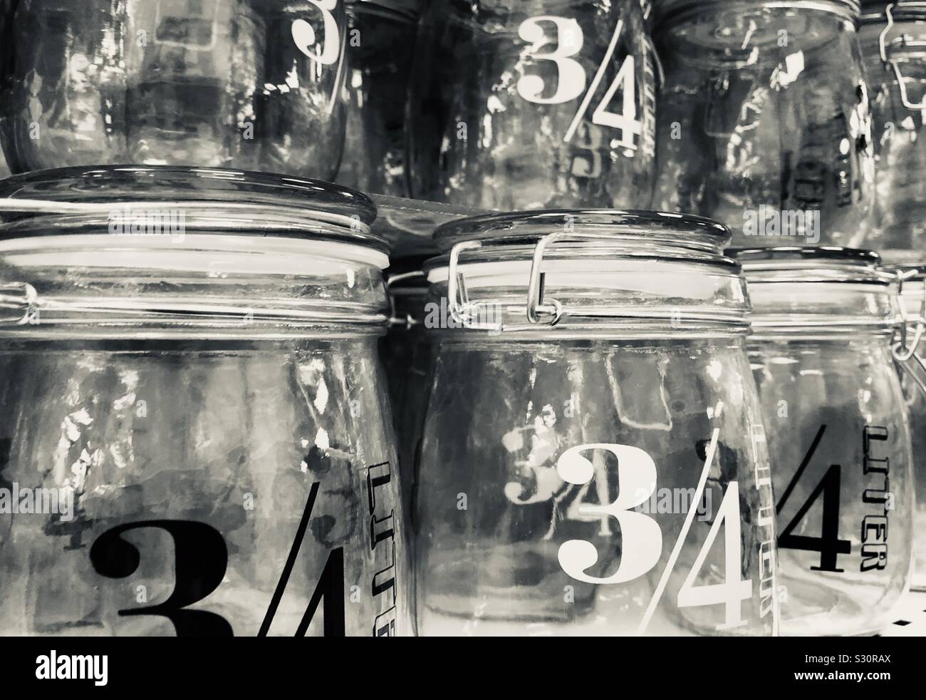 Glass jars on display Stock Photo Alamy