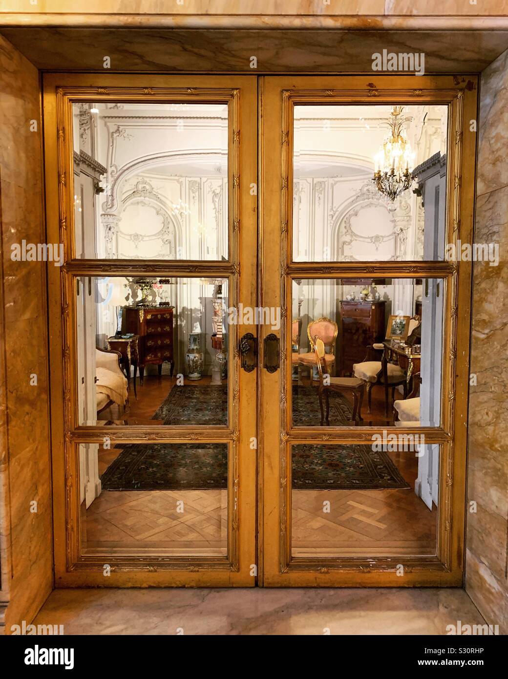 Looking Through Interior Doors Towards A Room At Marble