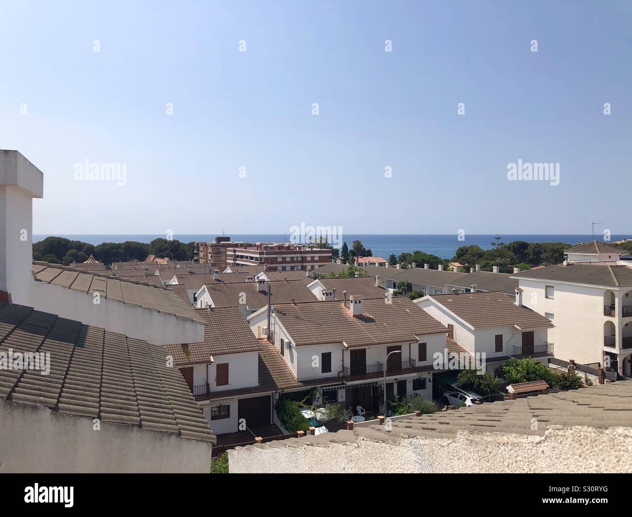 Top roof view with seascape in El Vendrell, Spain - Smartphone Captured Stock Image