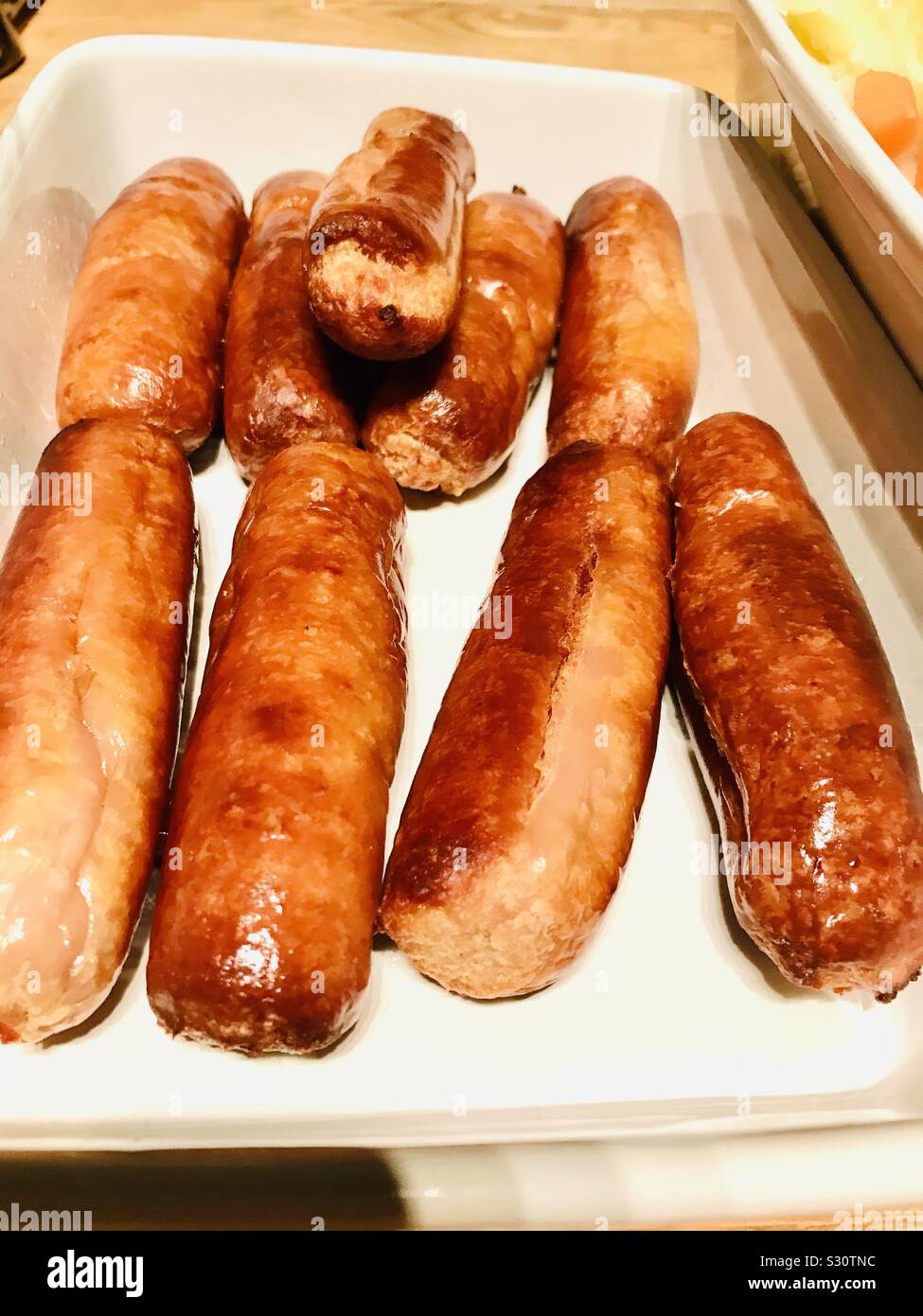 Cooked pork sausages Stock Photo