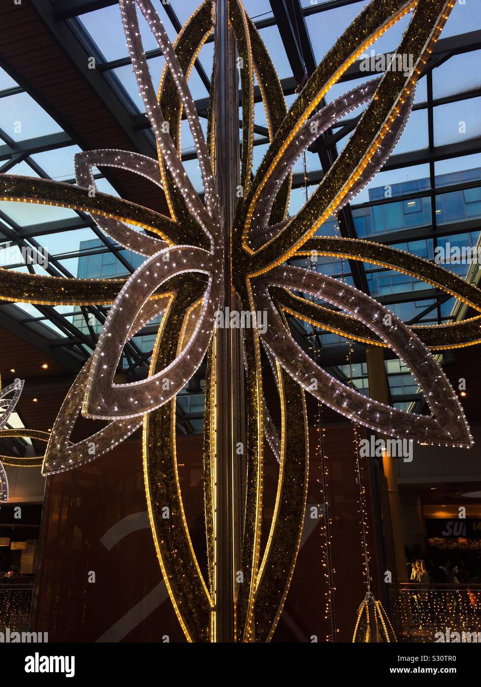 Large glittering Christmas decoration in shopping centre - Smartphone Captured Stock Image