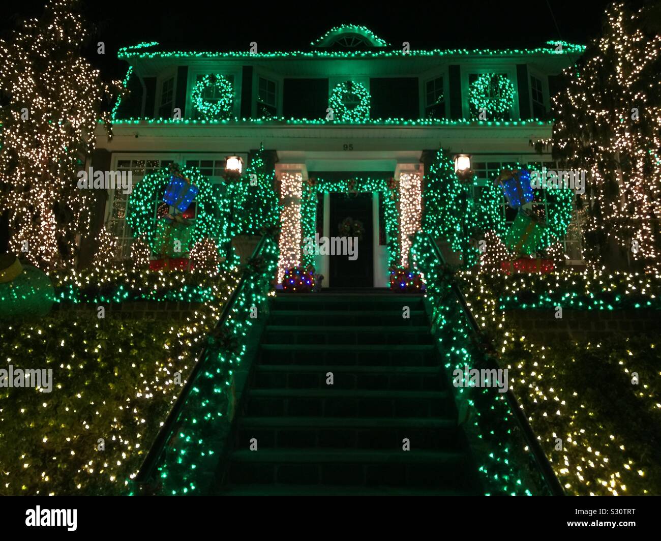 Elaborate Christmas decorations on a stately home in Bay Ridge Brooklyn Stock Photo