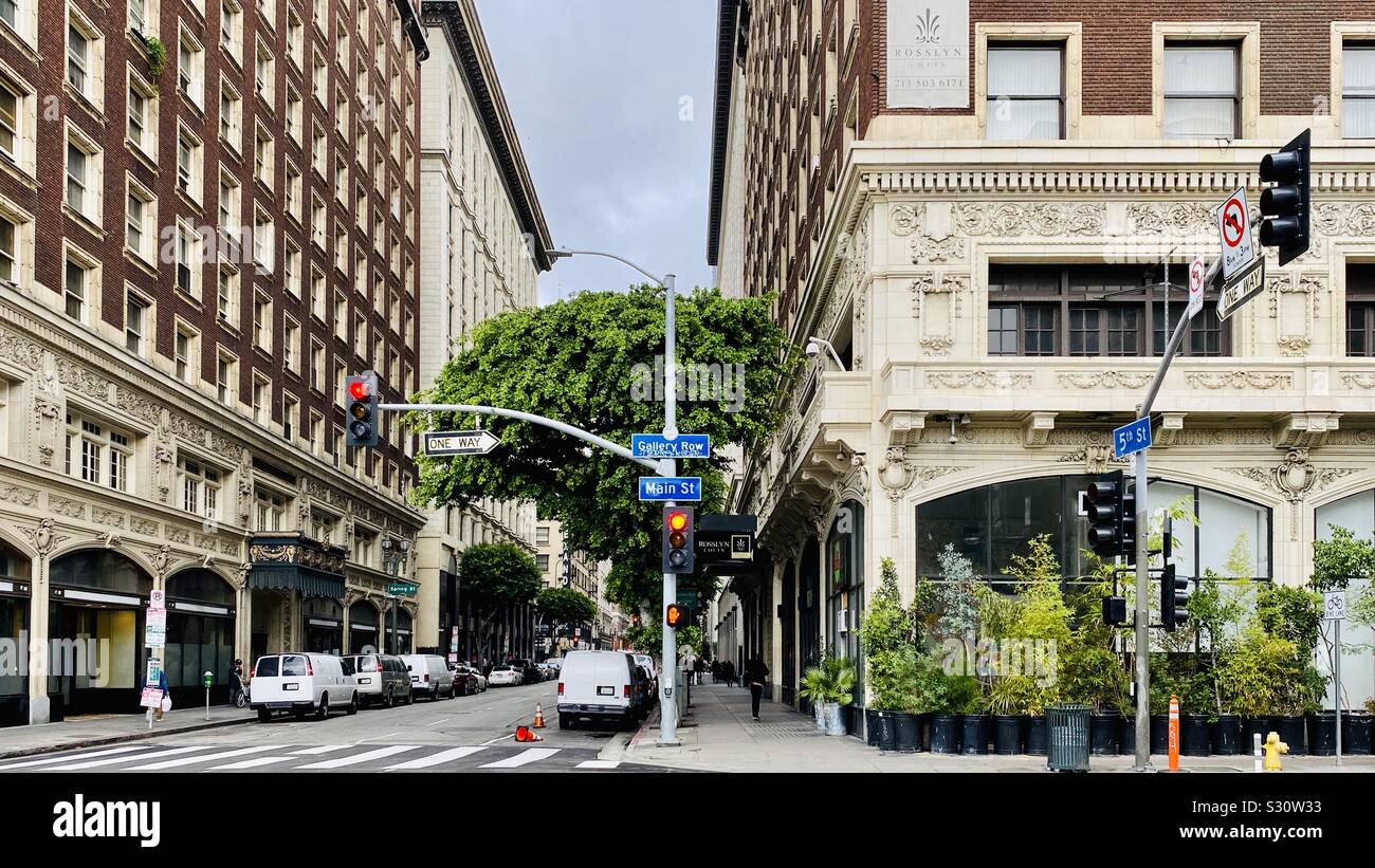 LOS ANGELES, CA, DEC 2019: view along 5th Street in the Historic Core of Downtown, looking past the Rosslyn Hotel and Rosslyn Lofts on Main Street - Smartphone Captured Stock Image