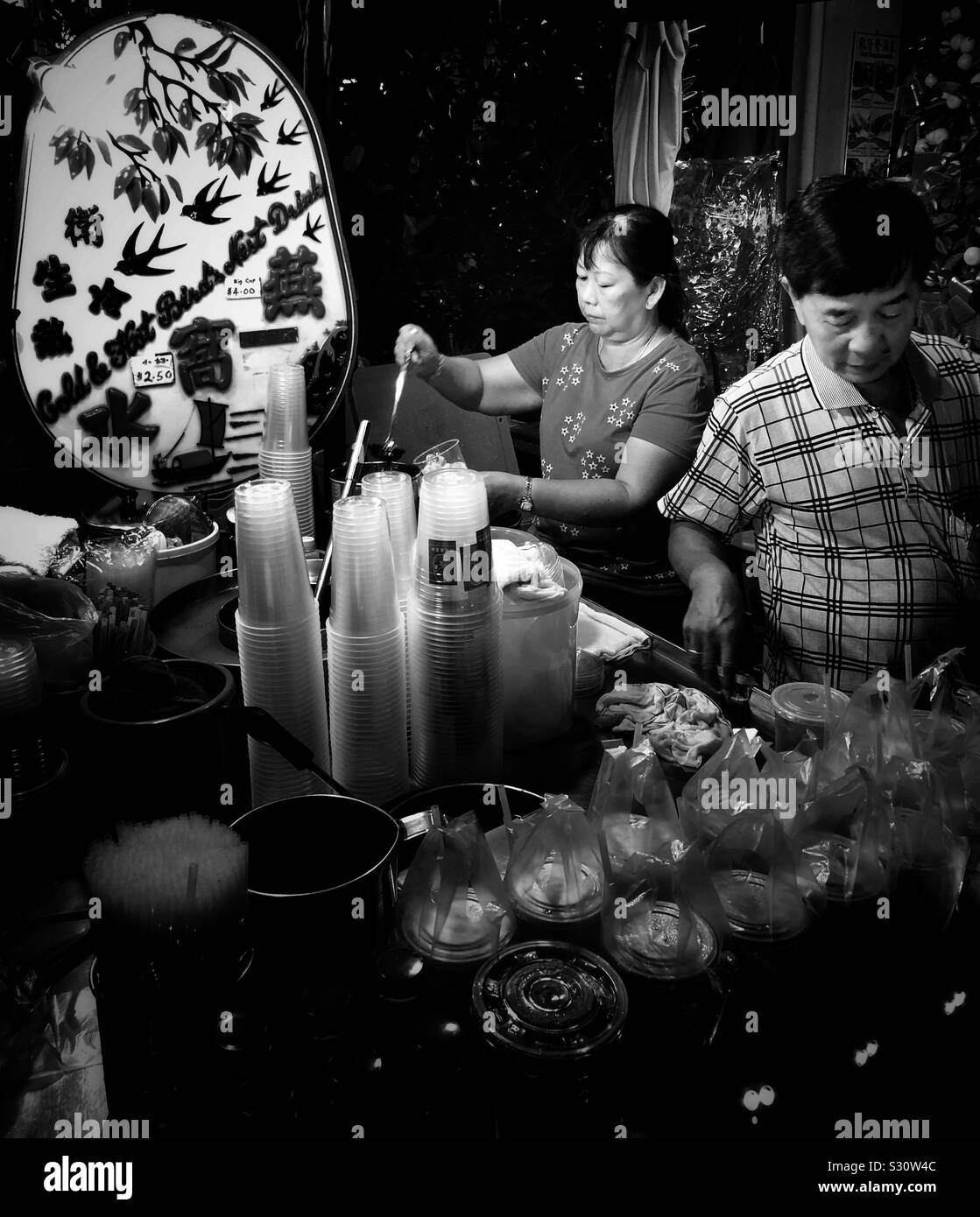 Hawker selling drinks Stock Photo