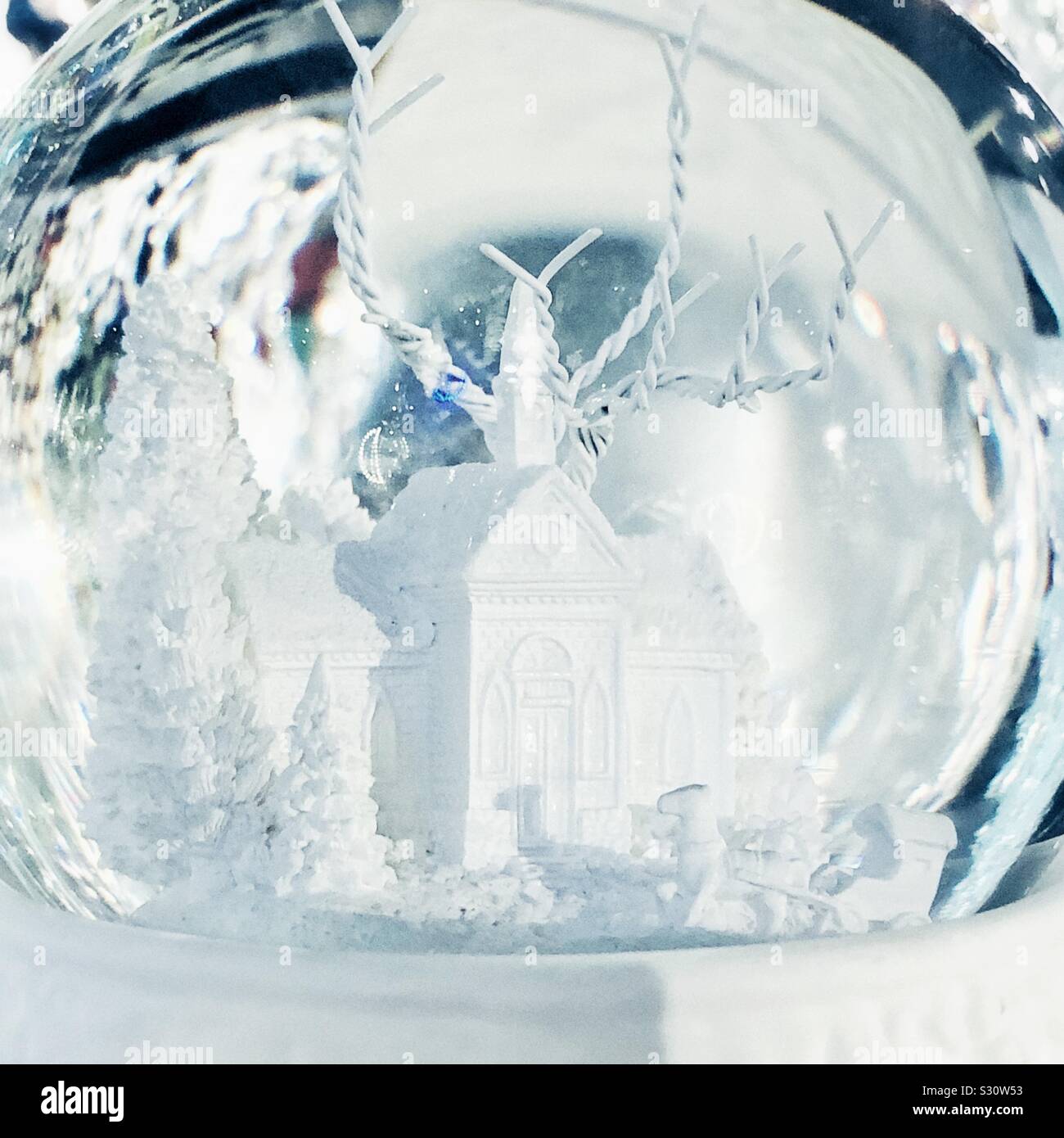 inside the white wintery snow globe Stock Photo