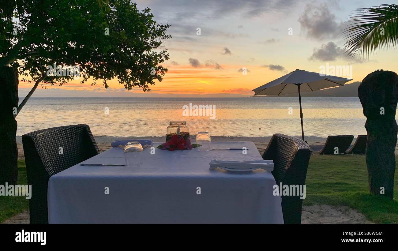 A sunset dinner on the beach - Smartphone Captured Stock Image