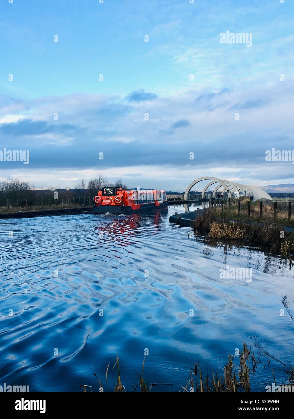 A boat heading into the 2002 Falkirk Wheel.  This rotating boat lift connects the Union and Forth and Clyde canals, Scotland Stock Photo