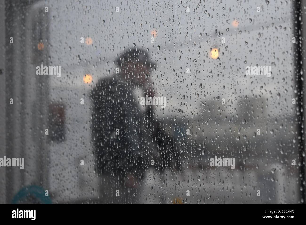 Anime eboy smoking in the rain