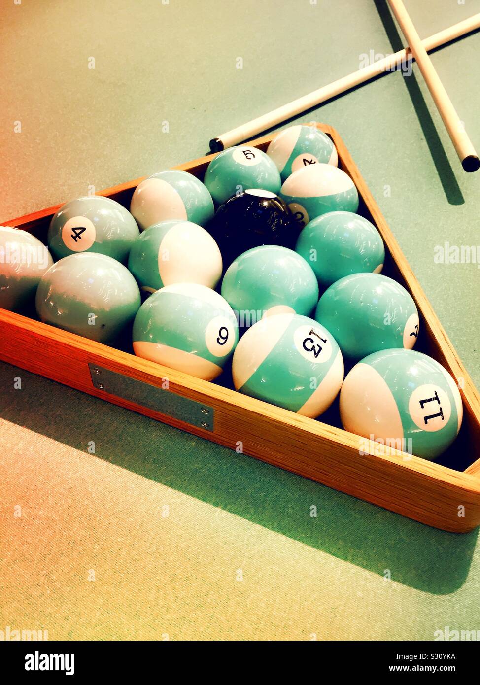 Tiffany and Company features a pool table and it’s signature robin egg blue color, NYC, USA - Smartphone Captured Stock Image