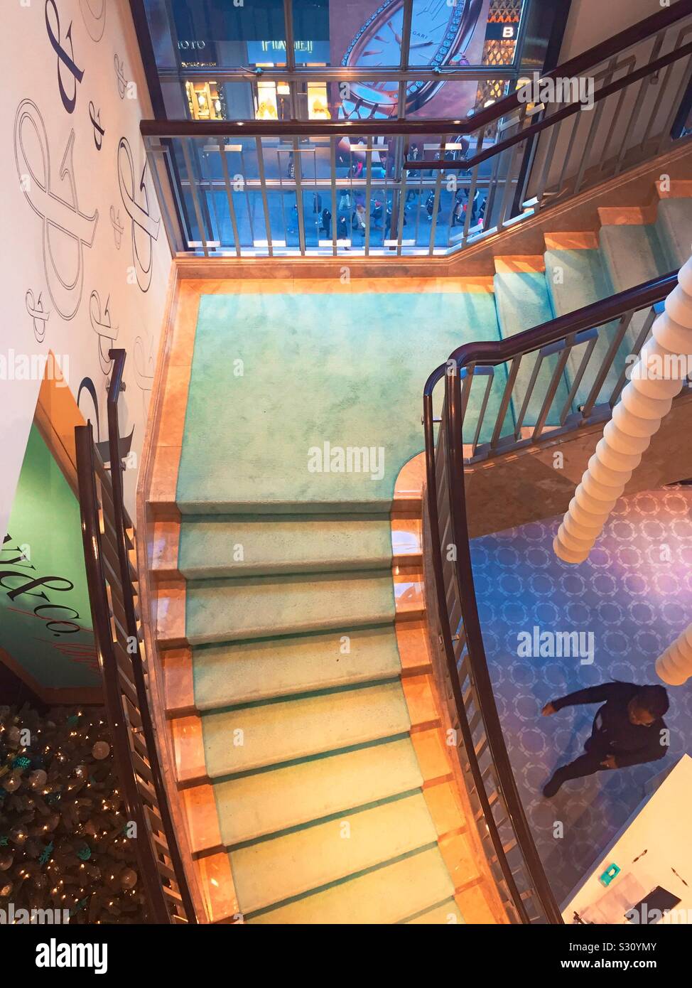 Tiffany & Co. Features a staircase between floors in its flag ship location on fifth Avenue and 57th St. in midtown Manhattan, NYC, USA - Smartphone Captured Stock Image