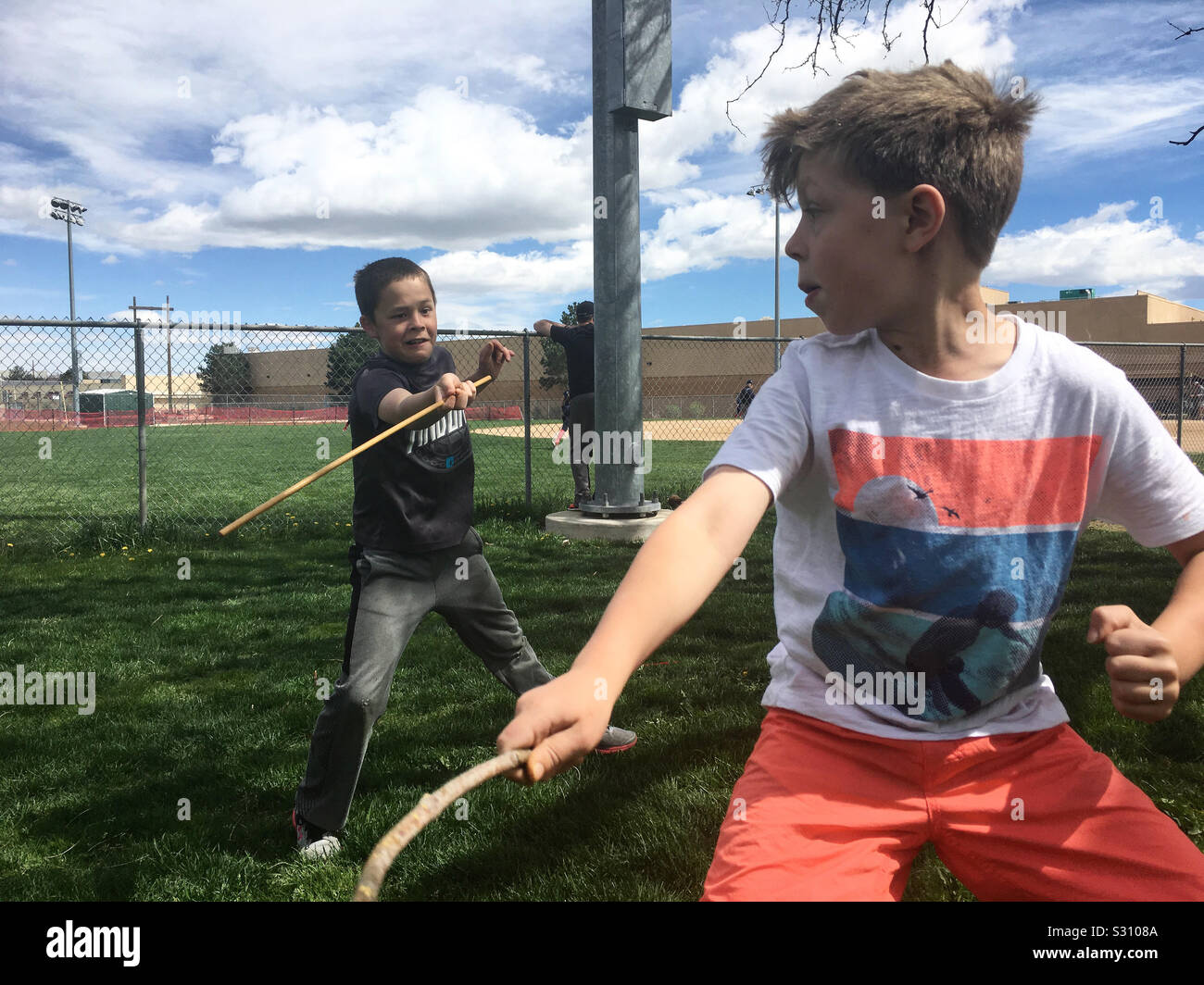 fight fighting boys Stock Photo - Alamy