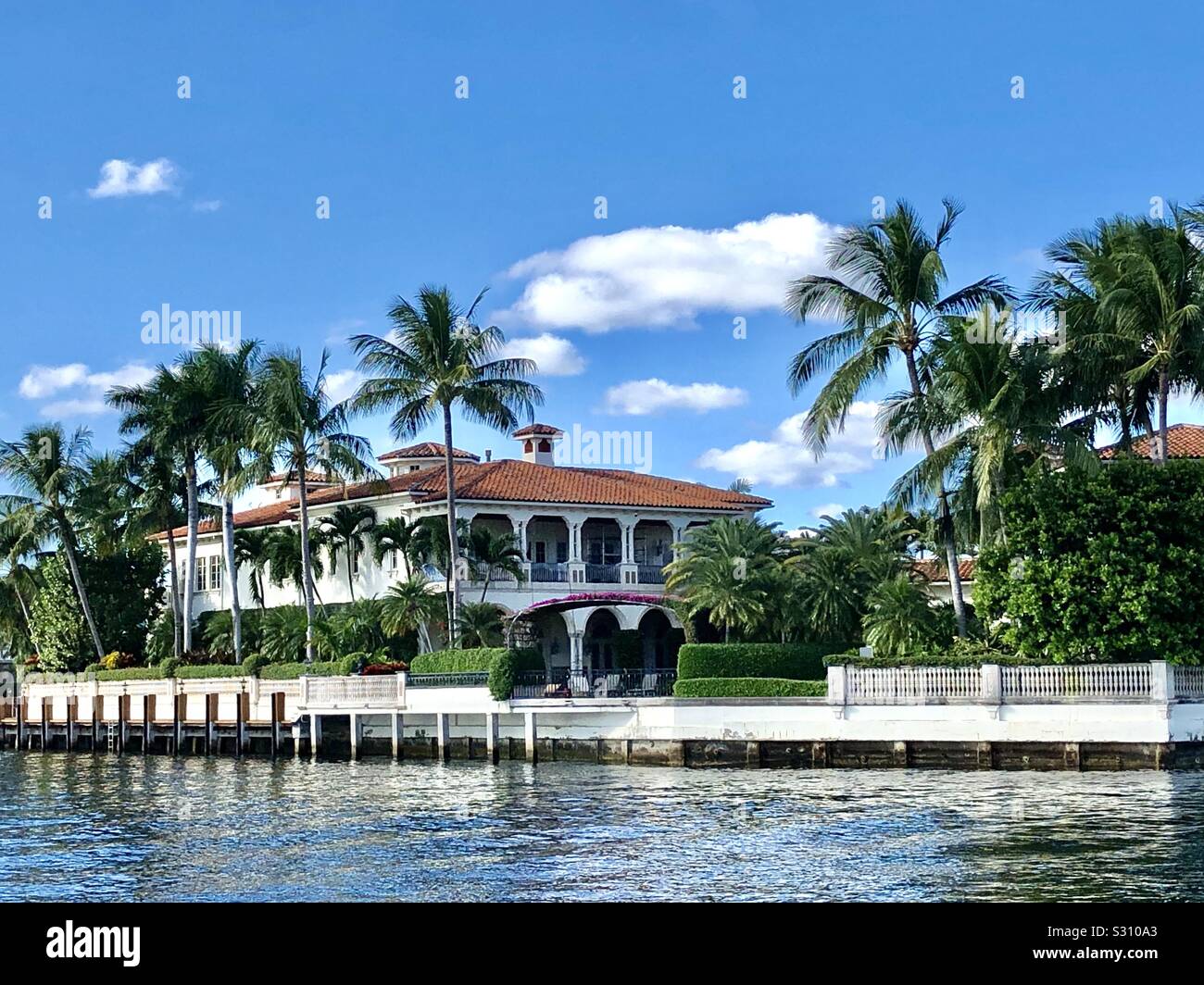 Upscale home along Florida’s Intracoastal Waterway, southeast Florida, between Delray Beach and Boca Raton. - Smartphone Captured Stock Image