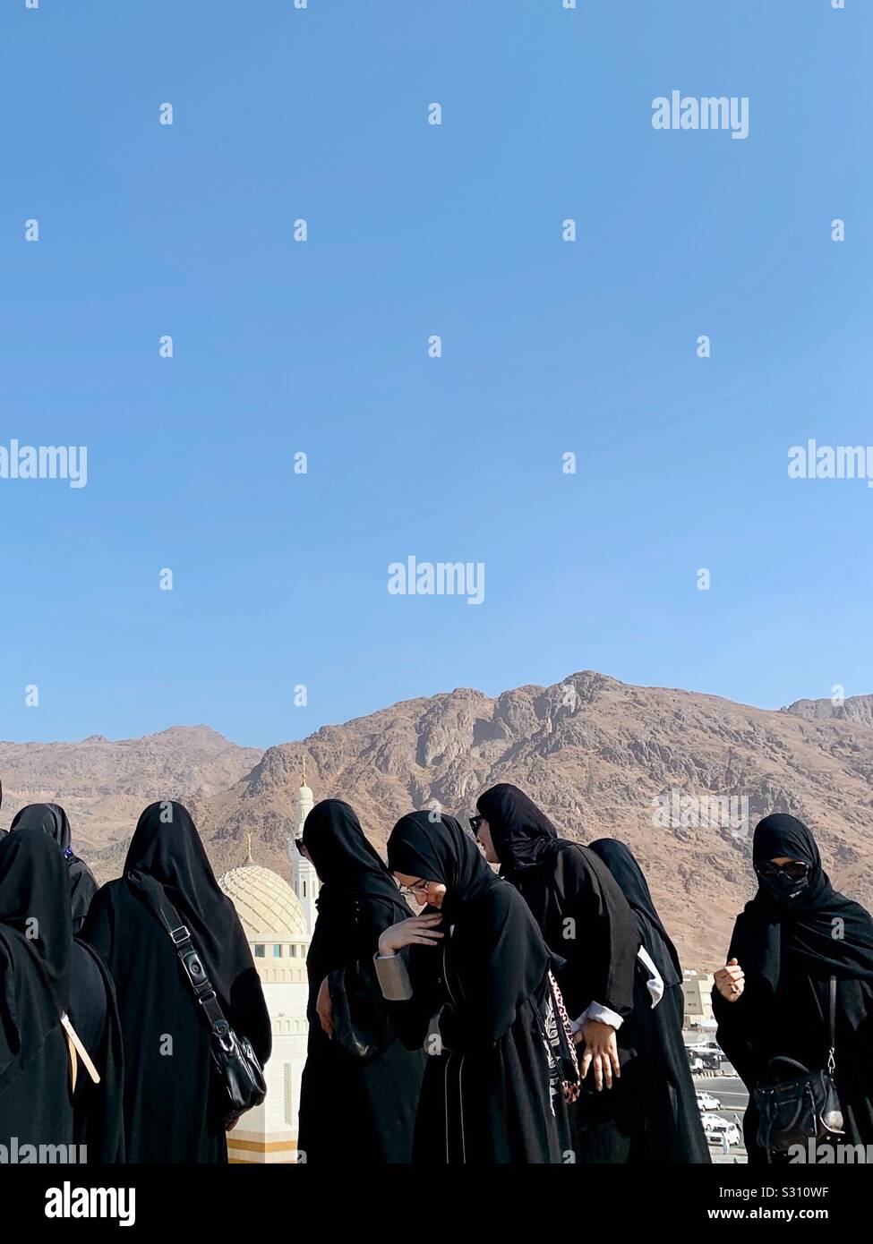 Hijab and Burqa in Jabal Uhud Stock Photo