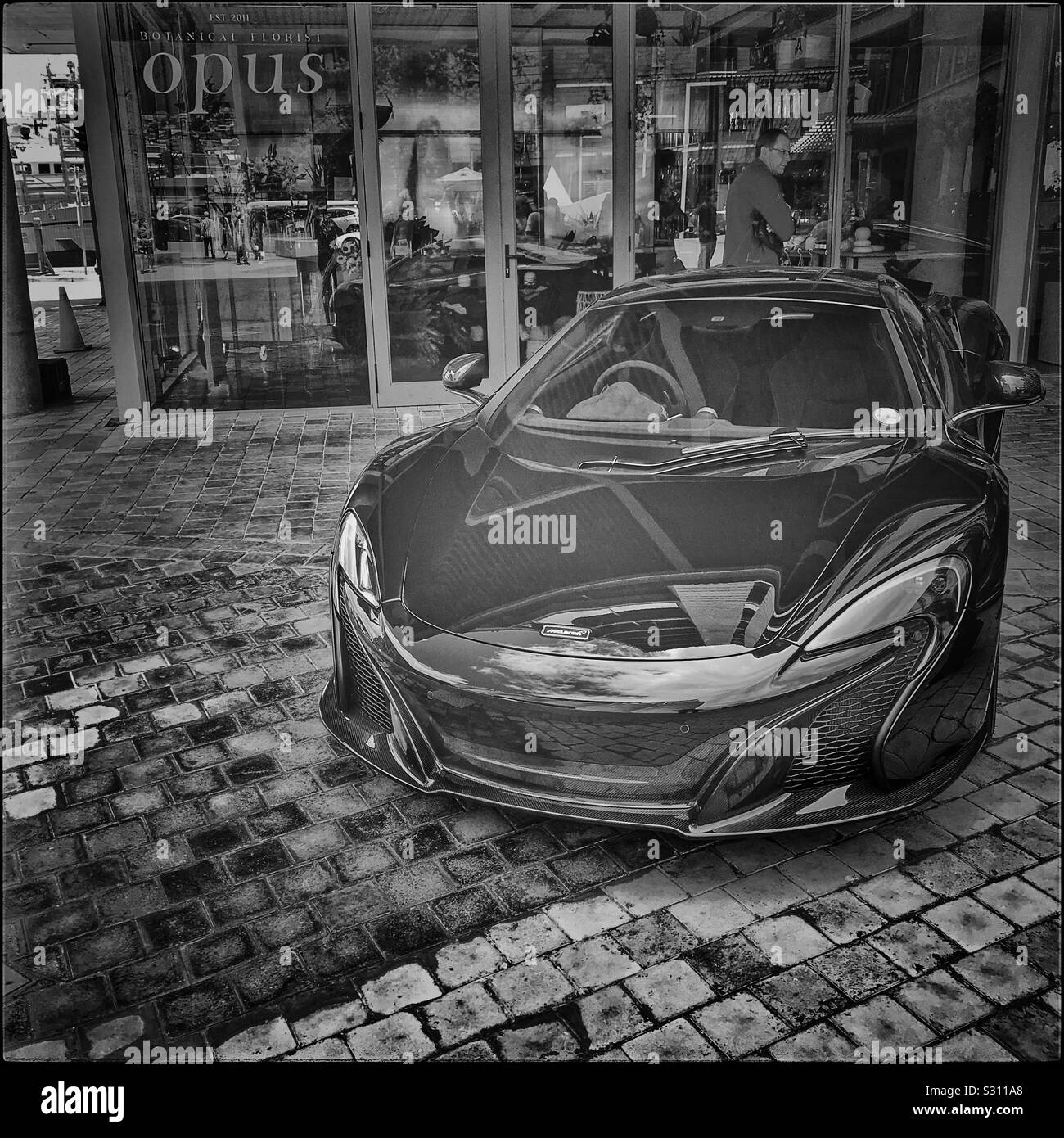 The Cape Town Motor Show, V&A Waterfront, Cape Town, South Africa. Black and white photo. - Smartphone Captured Stock Image