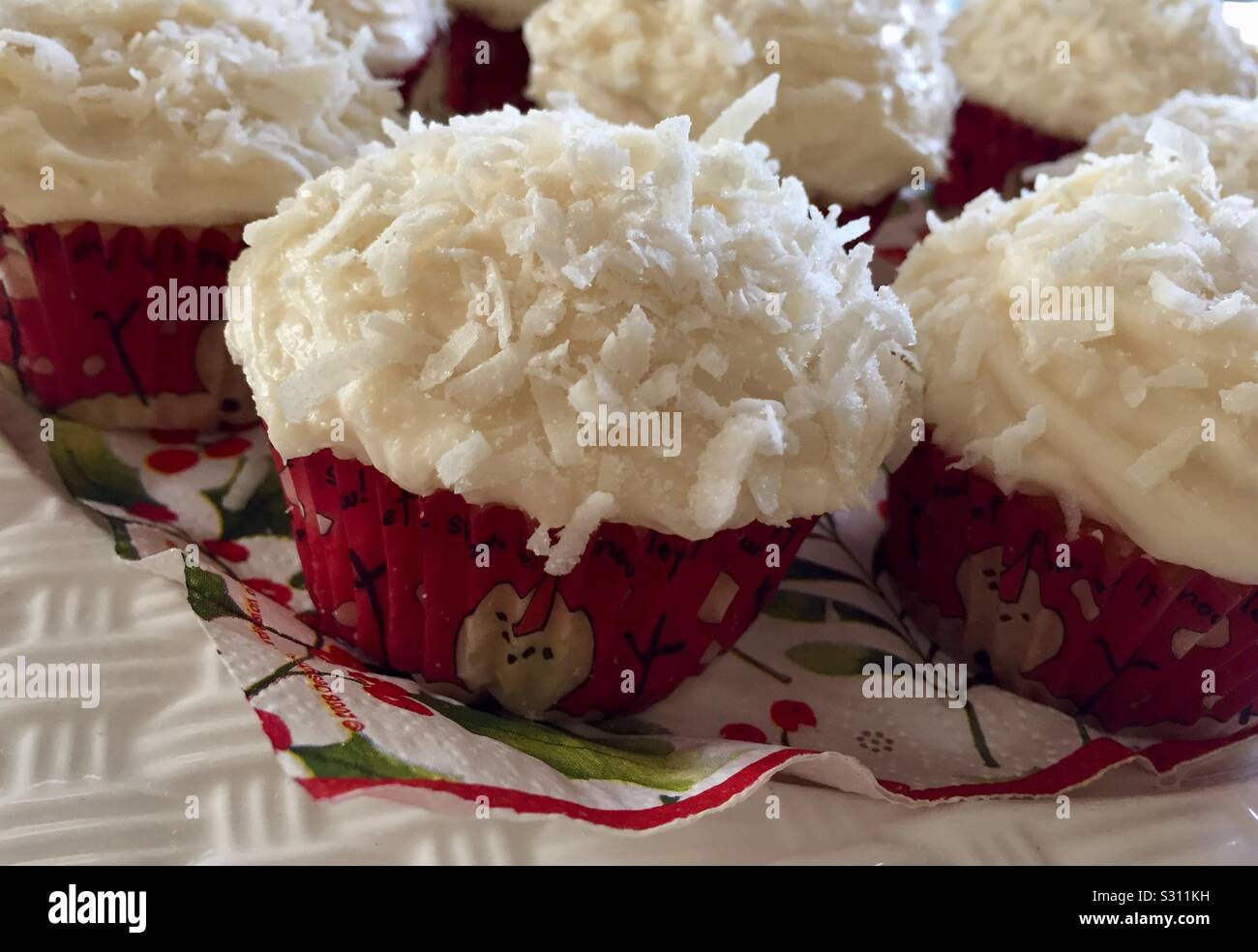 Coconut Cream Cheese Frosted Cupcakes Stock Photo