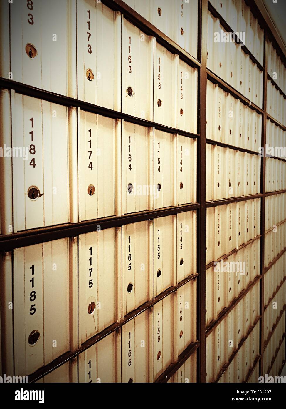 A wall of PO boxes in a United States post office. - Smartphone Captured Stock Image