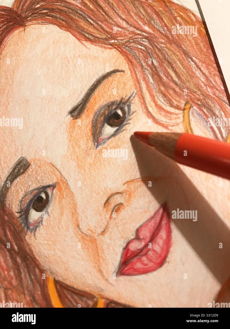Red pencil colouring face. Illustration. Stock Photo