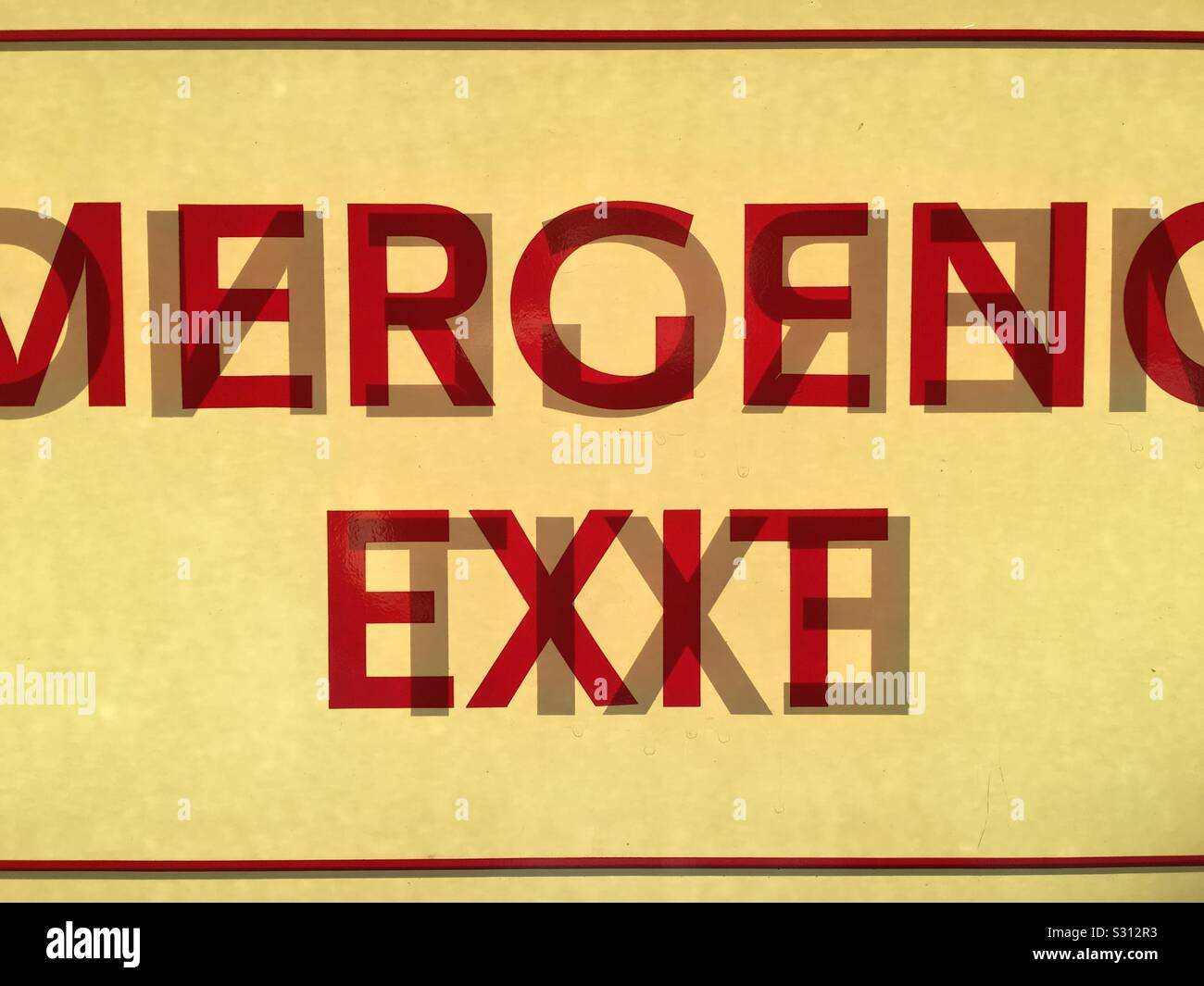 Emergency Exit sign on glass door Stock Photo Alamy