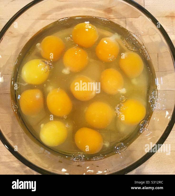 Egg yolks in glass bowl Stock Photo Alamy