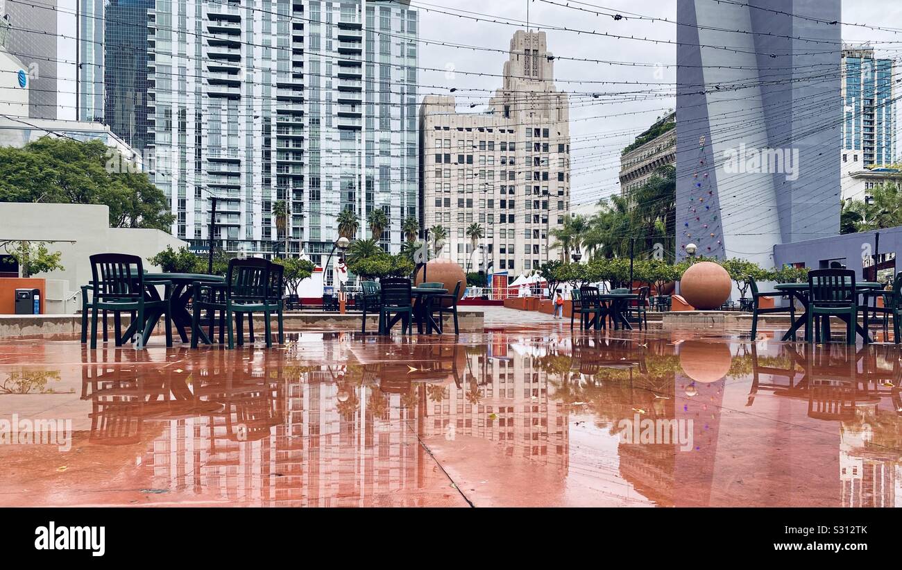 LOS ANGELES, CA, DEC 2019: view across Pershing Square with new apartment building in background, Downtown after rain - Smartphone Captured Stock Image