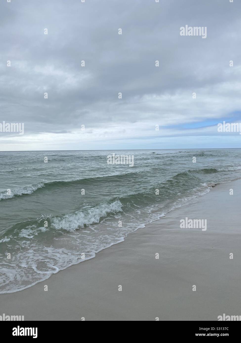 Seascape with rolling waves and cloudy skies - Smartphone Captured Stock Image