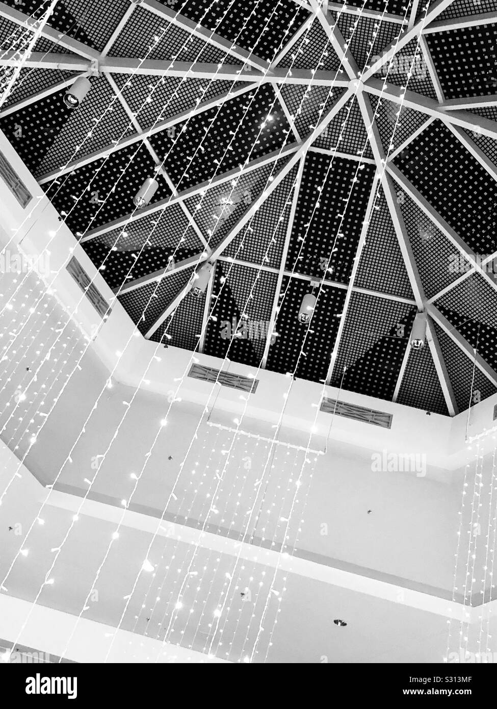 Domed abstract ceiling in black and white using geometric shapes. - Smartphone Captured Stock Image