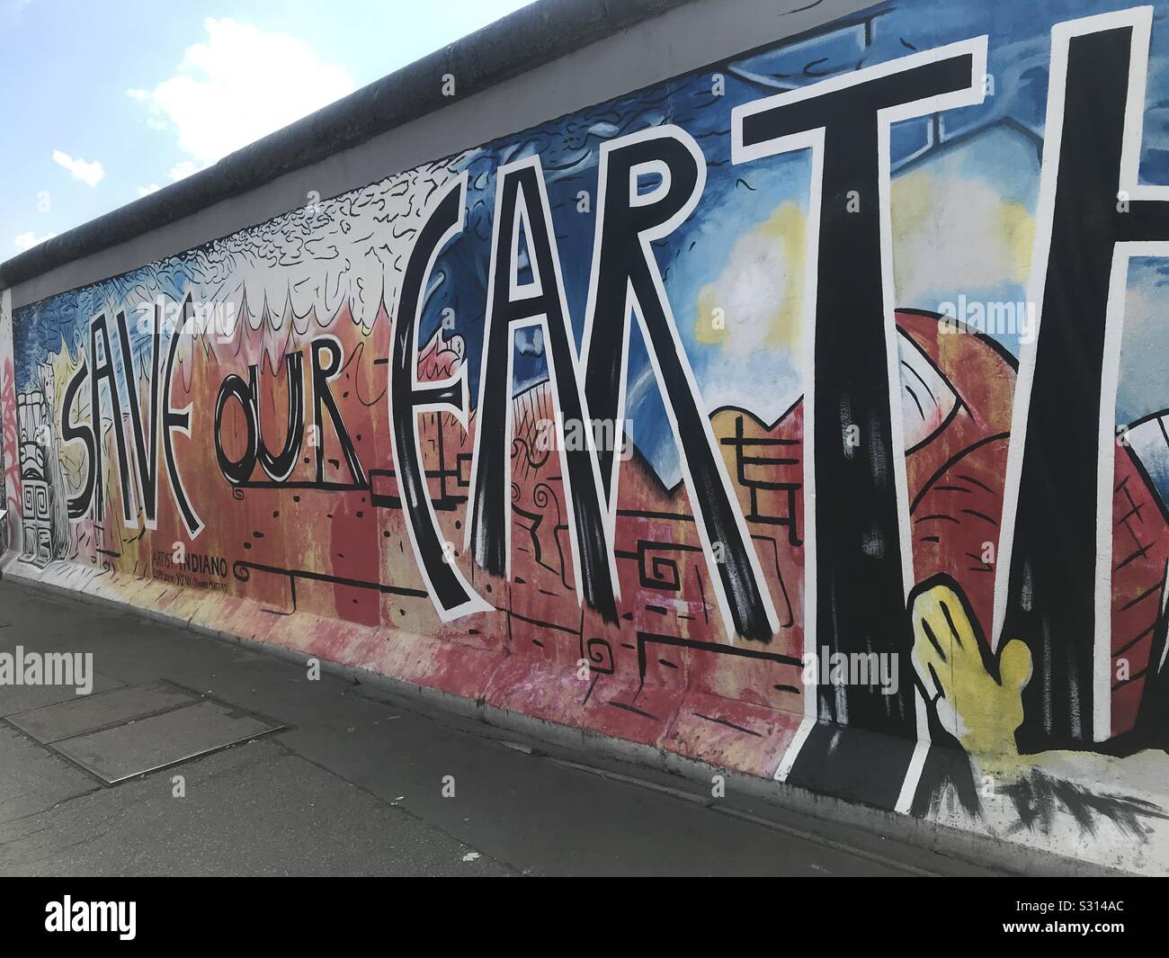 Colorful Save our Earth mural on Berlin Wall, Berlin, Germany Stock