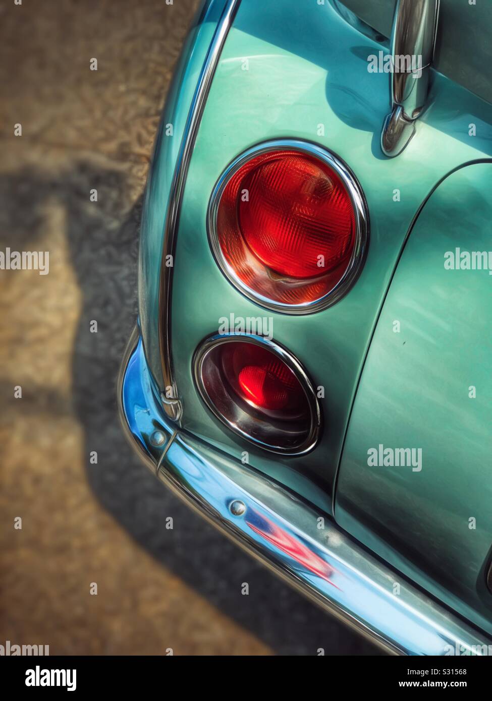 Taillights on a vintage Nissan Figaro - Smartphone Captured Stock Image