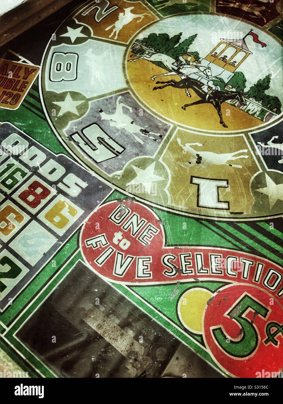 Graphics on a vintage coin operated game - Smartphone Captured Stock Image