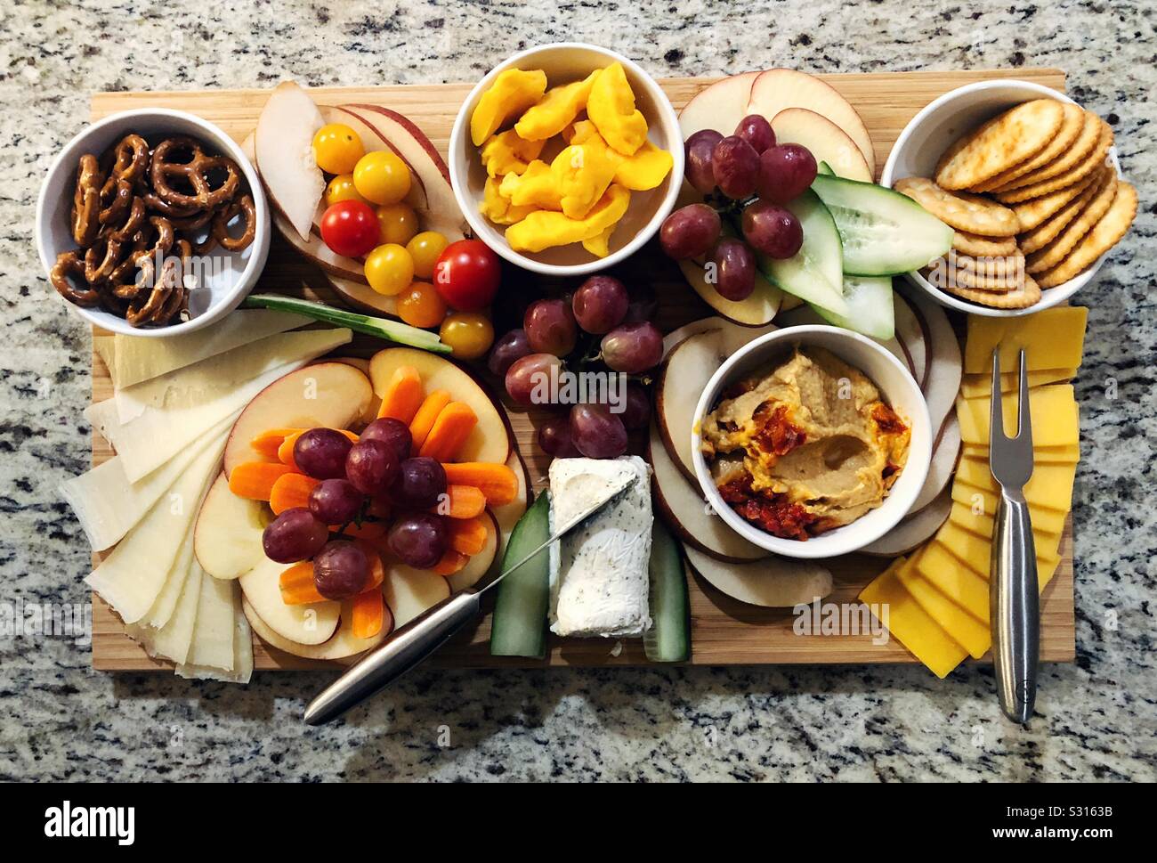 charcuterie board with cheeses and fruit Stock Photo Alamy