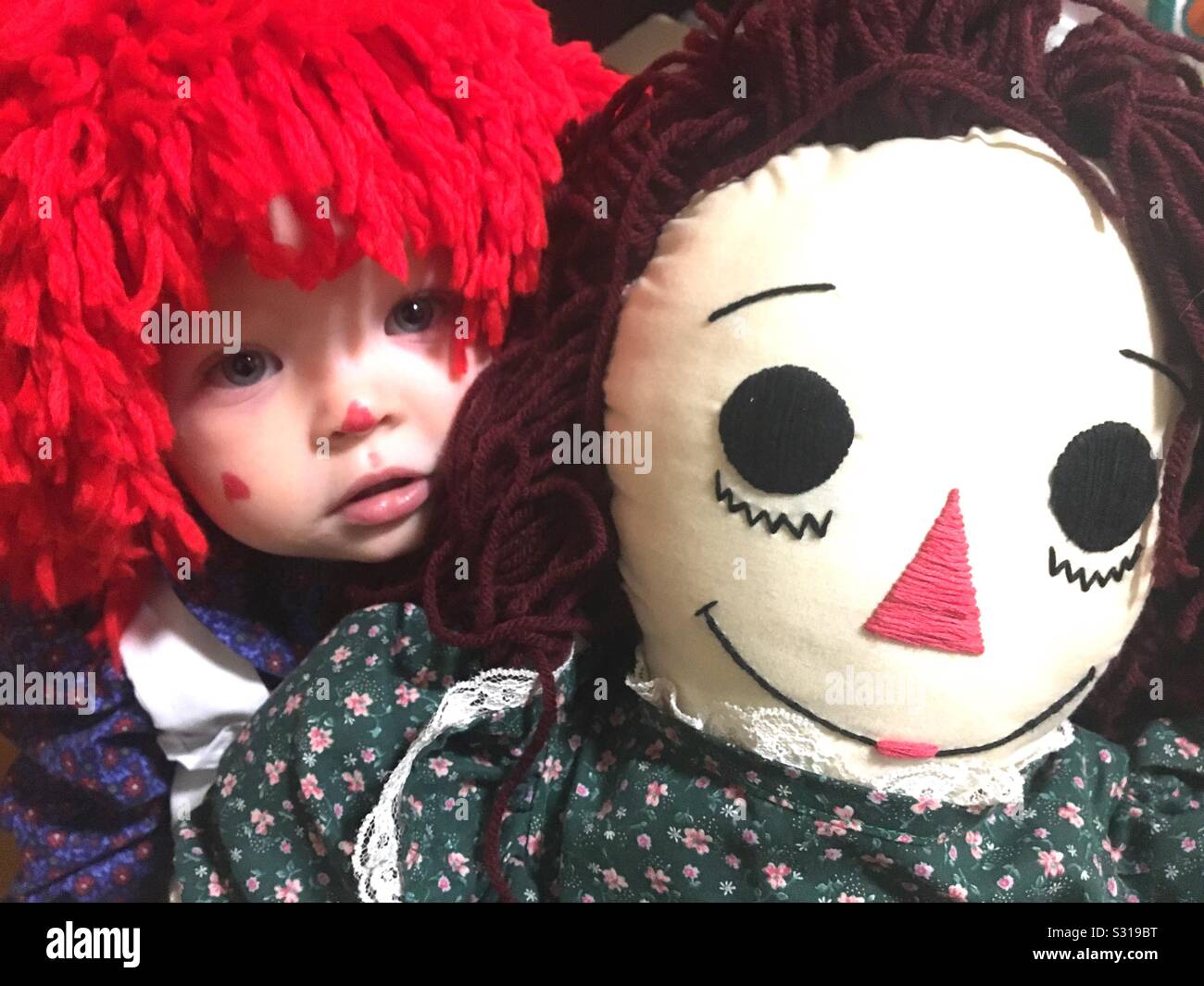 red haired doll with a triangle nose