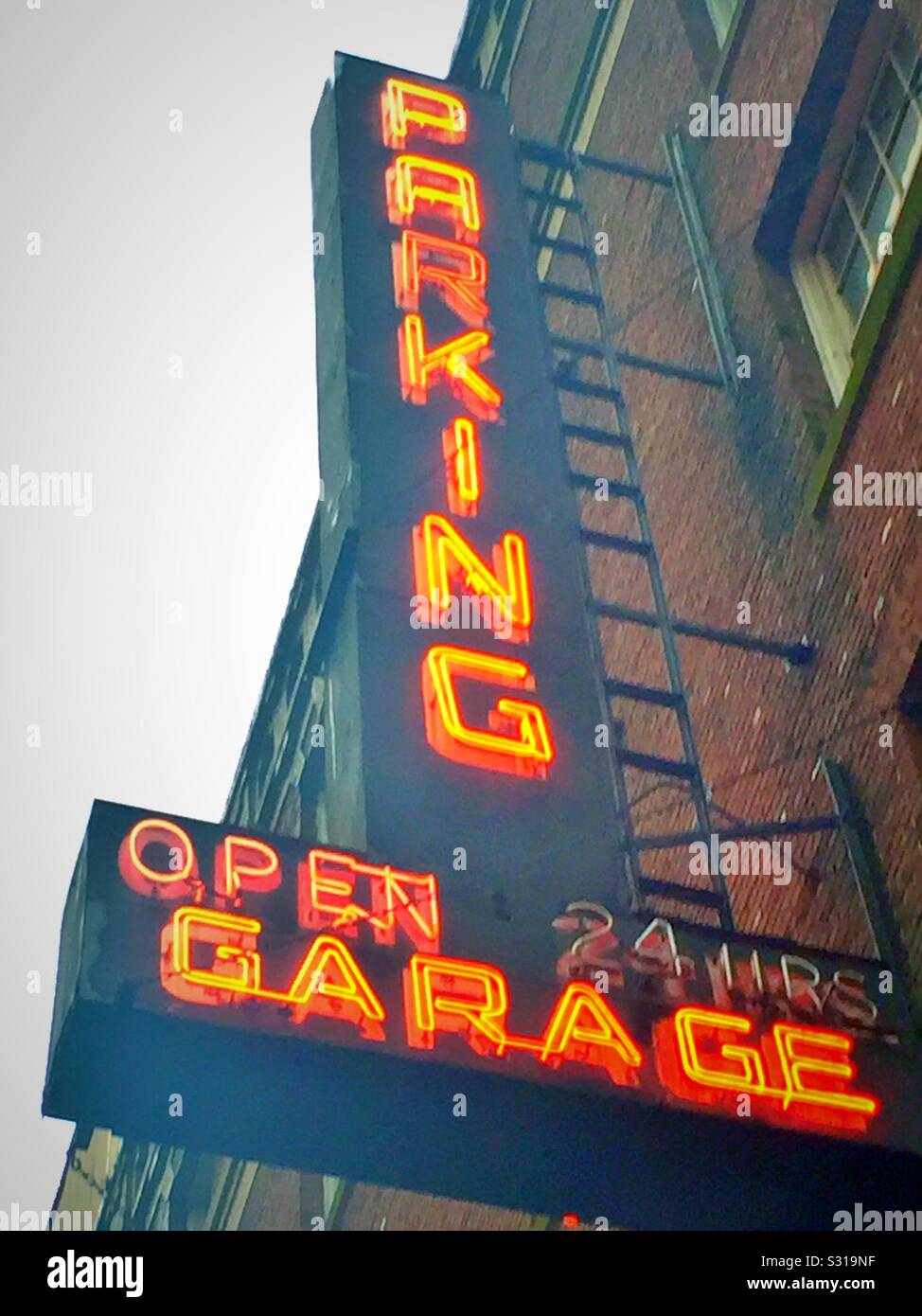 Garage Neon Sign stock photo. Image of buildings, street - 12377500