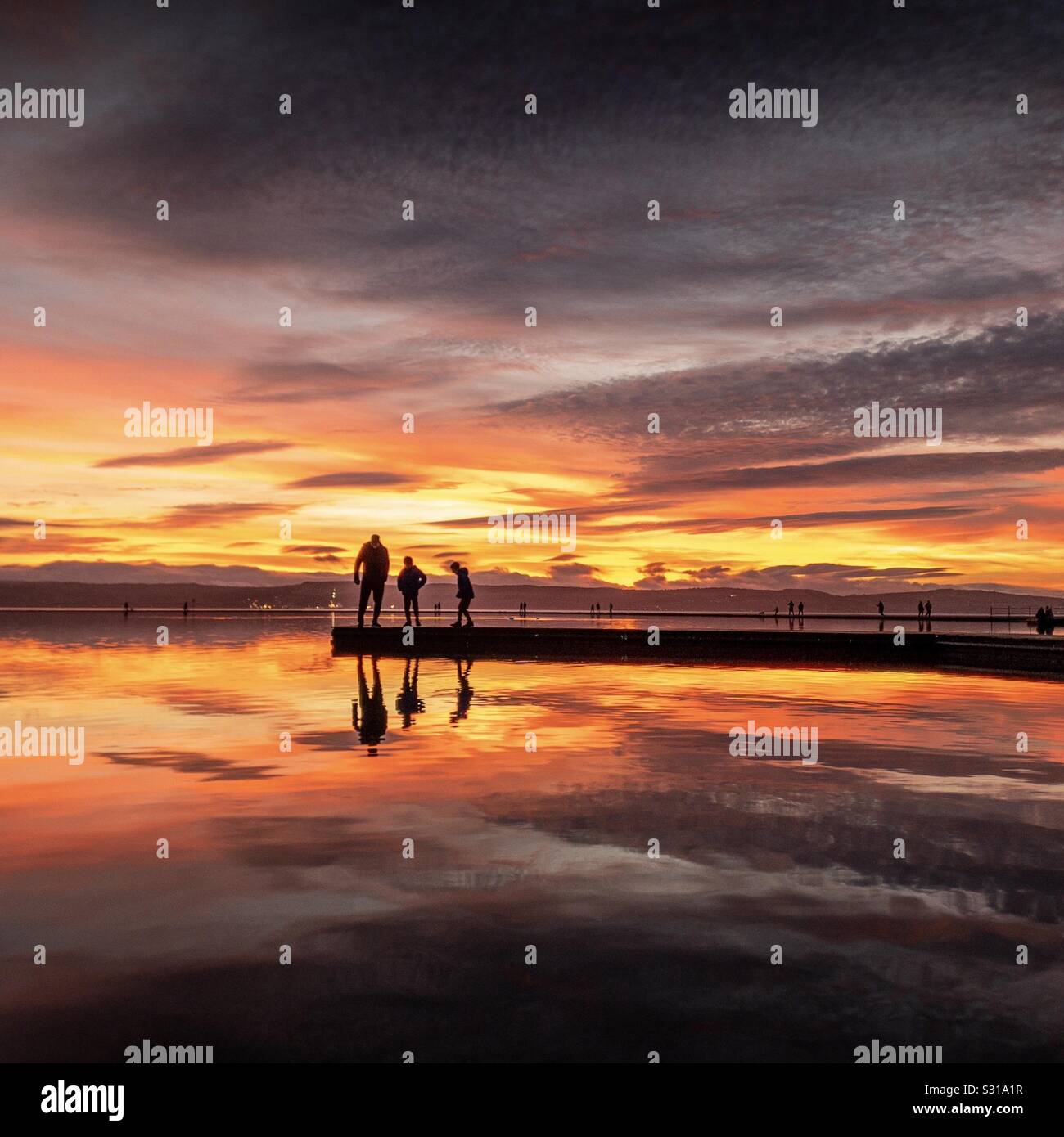 West Kirby Beach sunset. Sightseeing at the coast to watch the sun set. - Smartphone Captured Stock Image