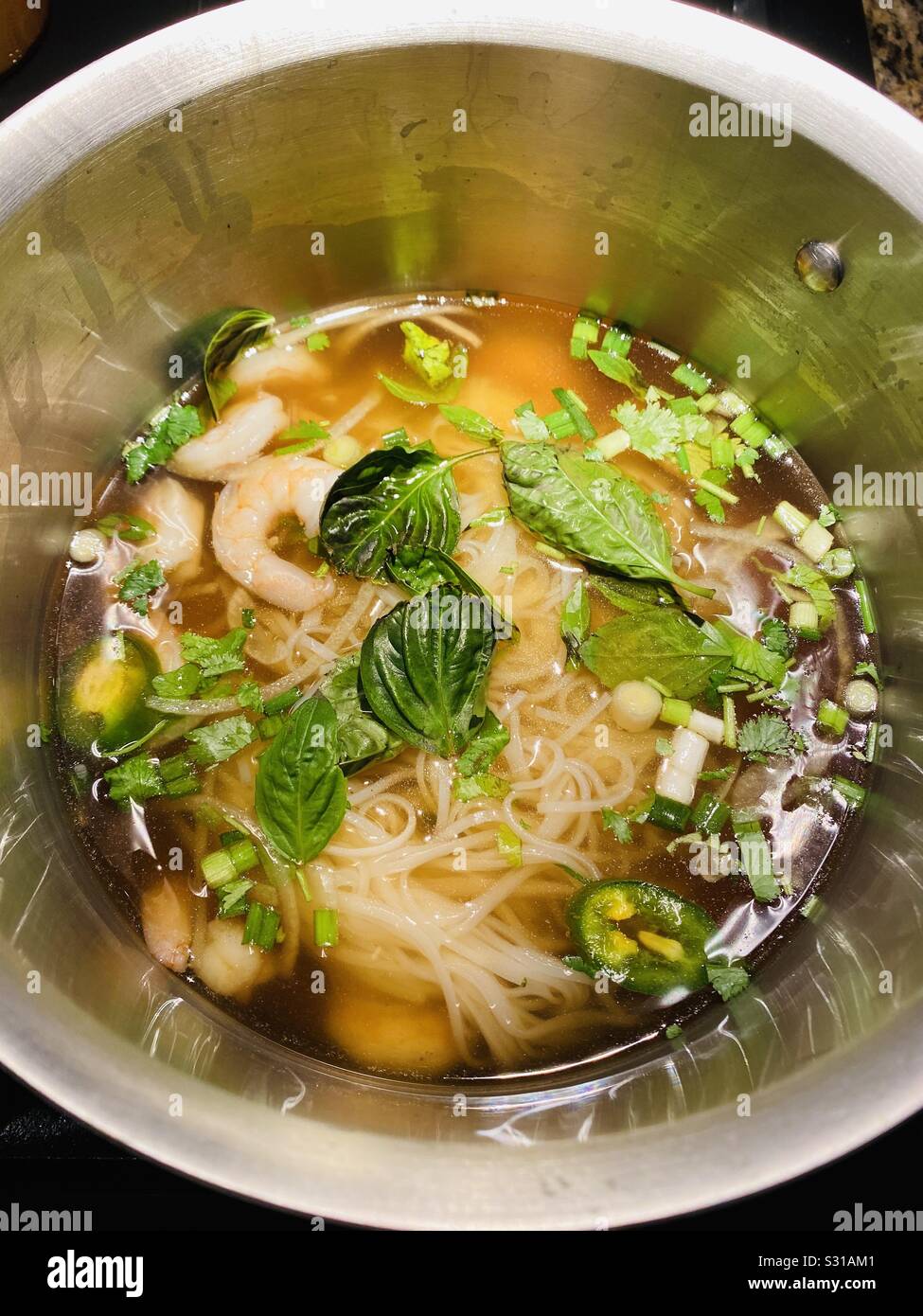 Making Shrimp Pho in pot Stock Photo - Alamy