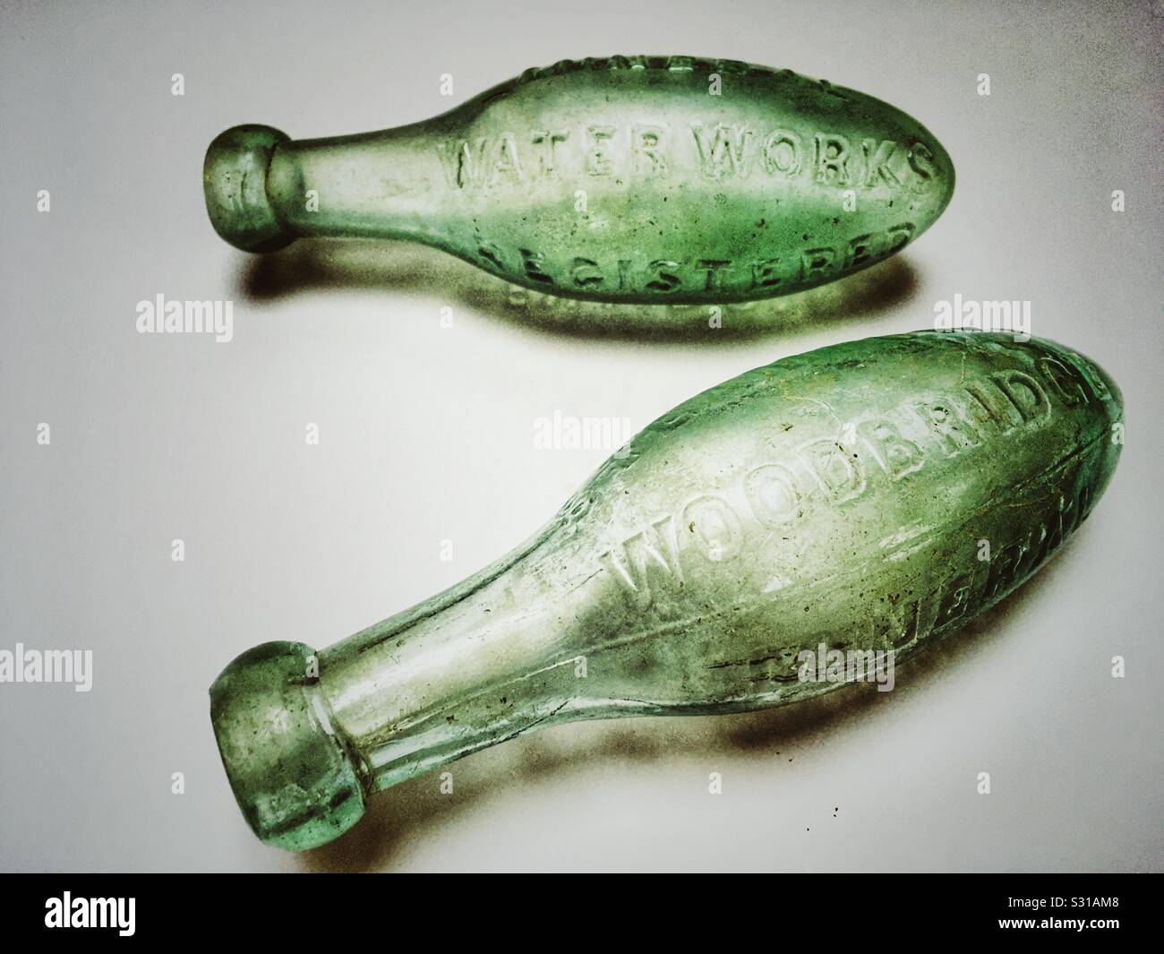 Antique mineral water torpedo glass bottles Stock Photo