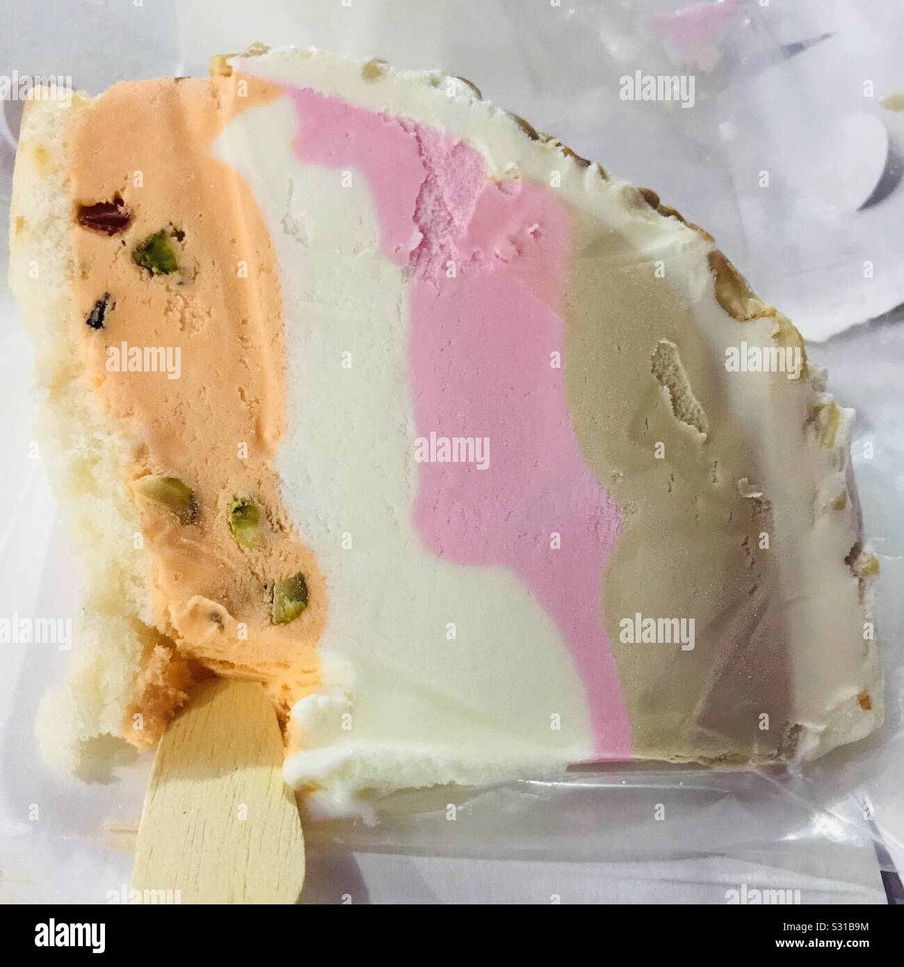 Cassatta Ice cream slice , one scoop tasted , multi flavoured with nuts