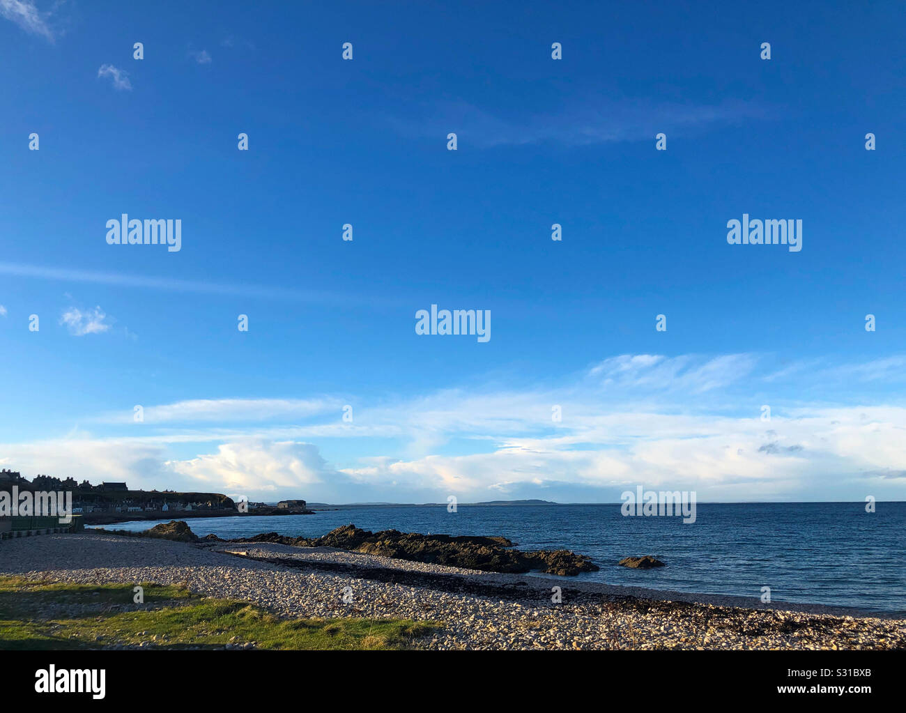 The Moray Firth and looking towards the village of Portessie from Strathlene, Buckie, Banffshire (Moray), Scotland, UK. Stock Photo