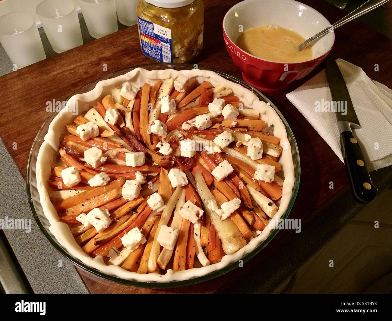 Homemade vegetable and cheese flan ready for baking in the oven. - Smartphone Captured Stock Image