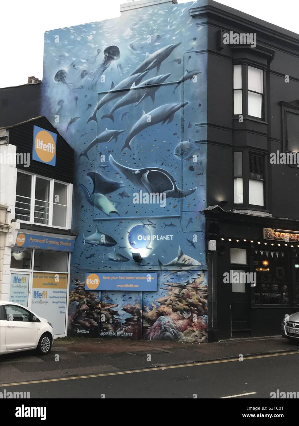 Wall mural on Upper St James’s Street, Brighton. Stock Photo