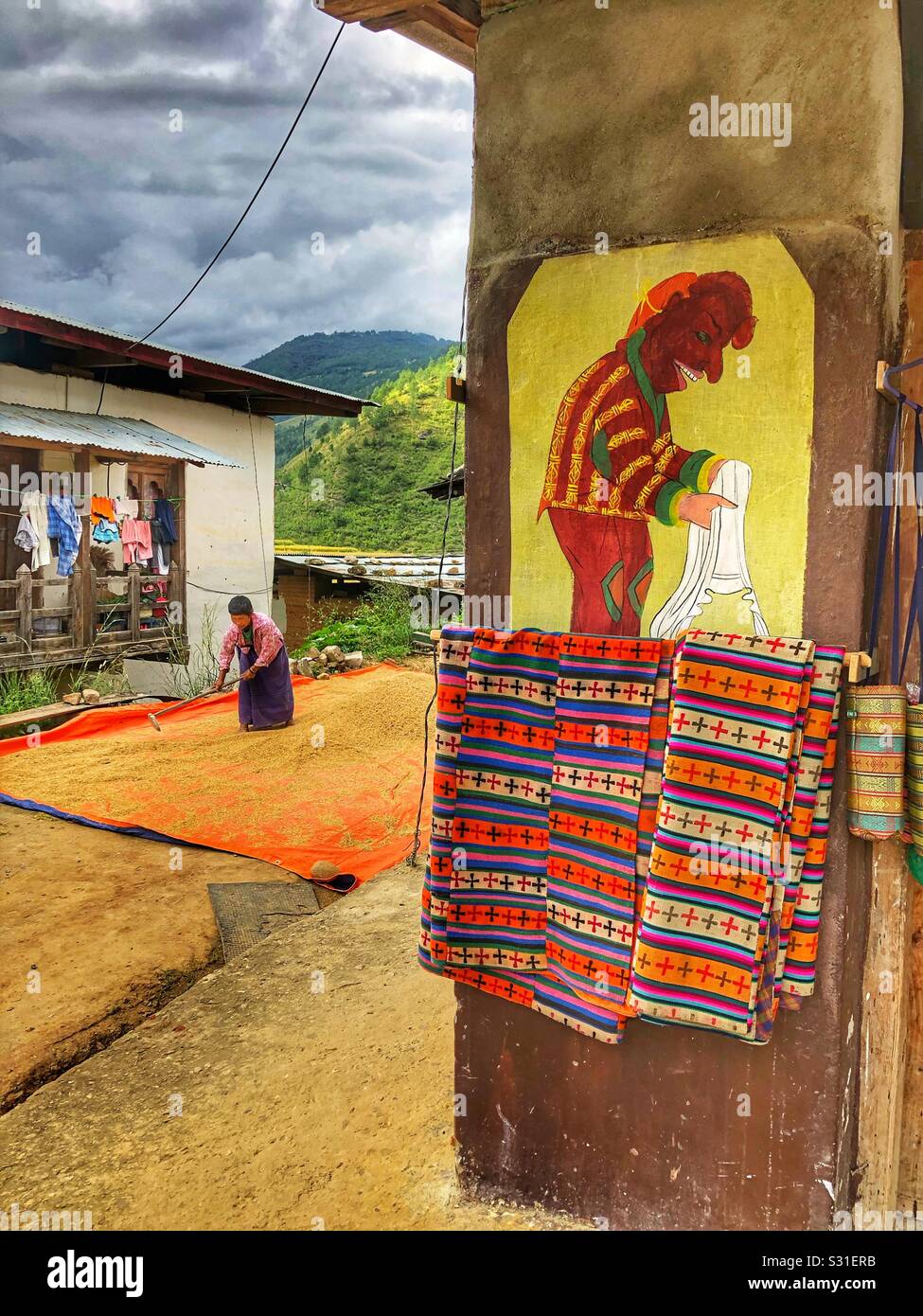A Bhutanese woman working. Stock Photo
