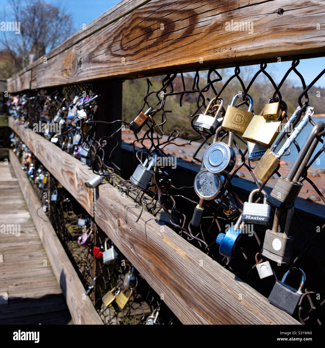 Locks of love on a bridge in Lynchburg , VA , - Smartphone Captured Stock Image