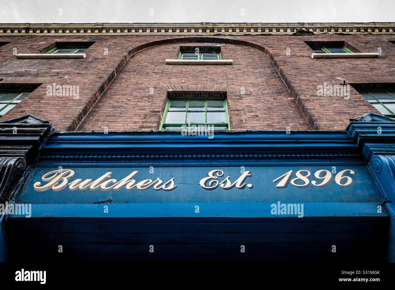 Painted Butchers sign. EST 1896 - Smartphone Captured Stock Image