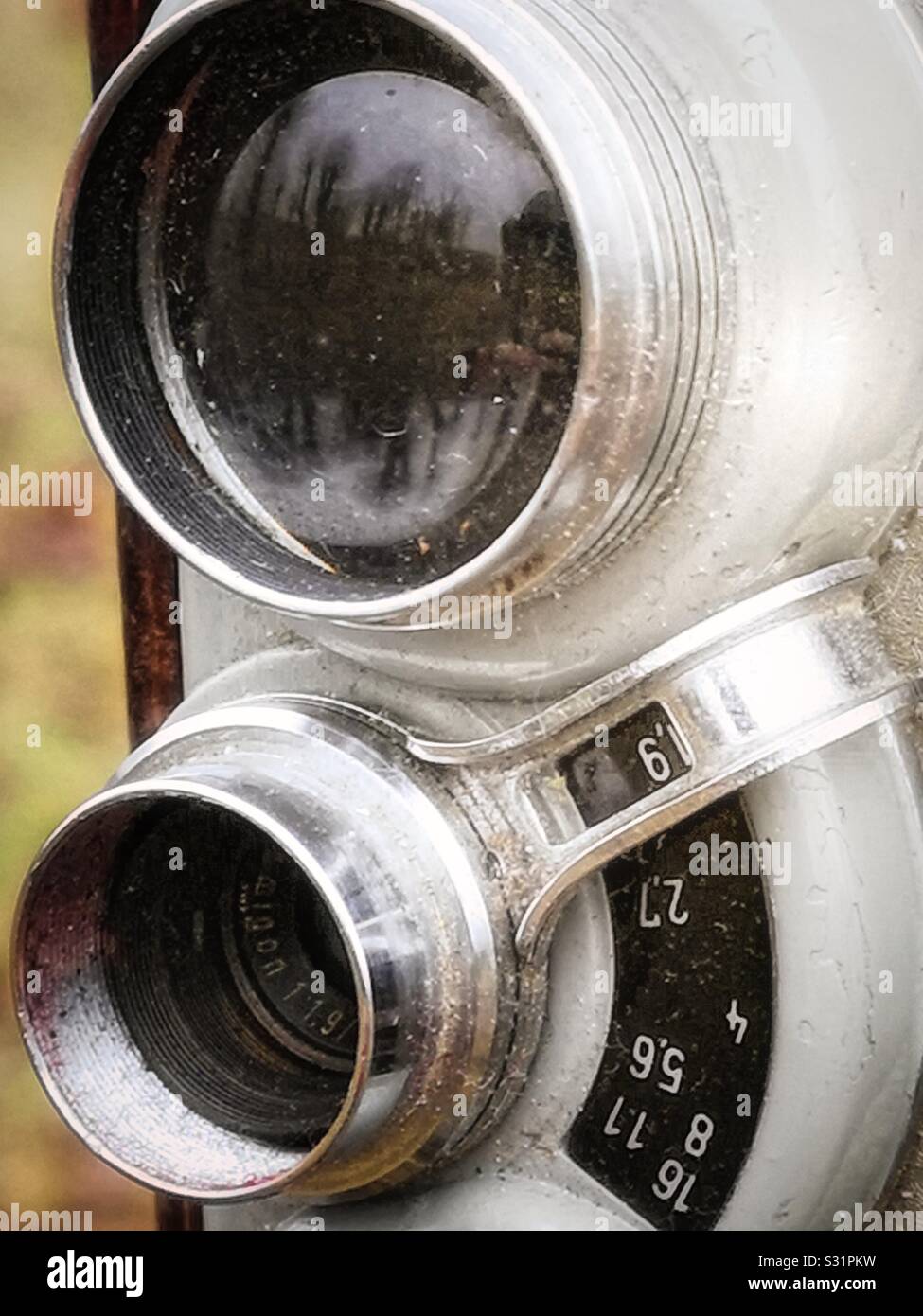 Close up lenses of old retro vintage movie camera - Smartphone Captured Stock Image