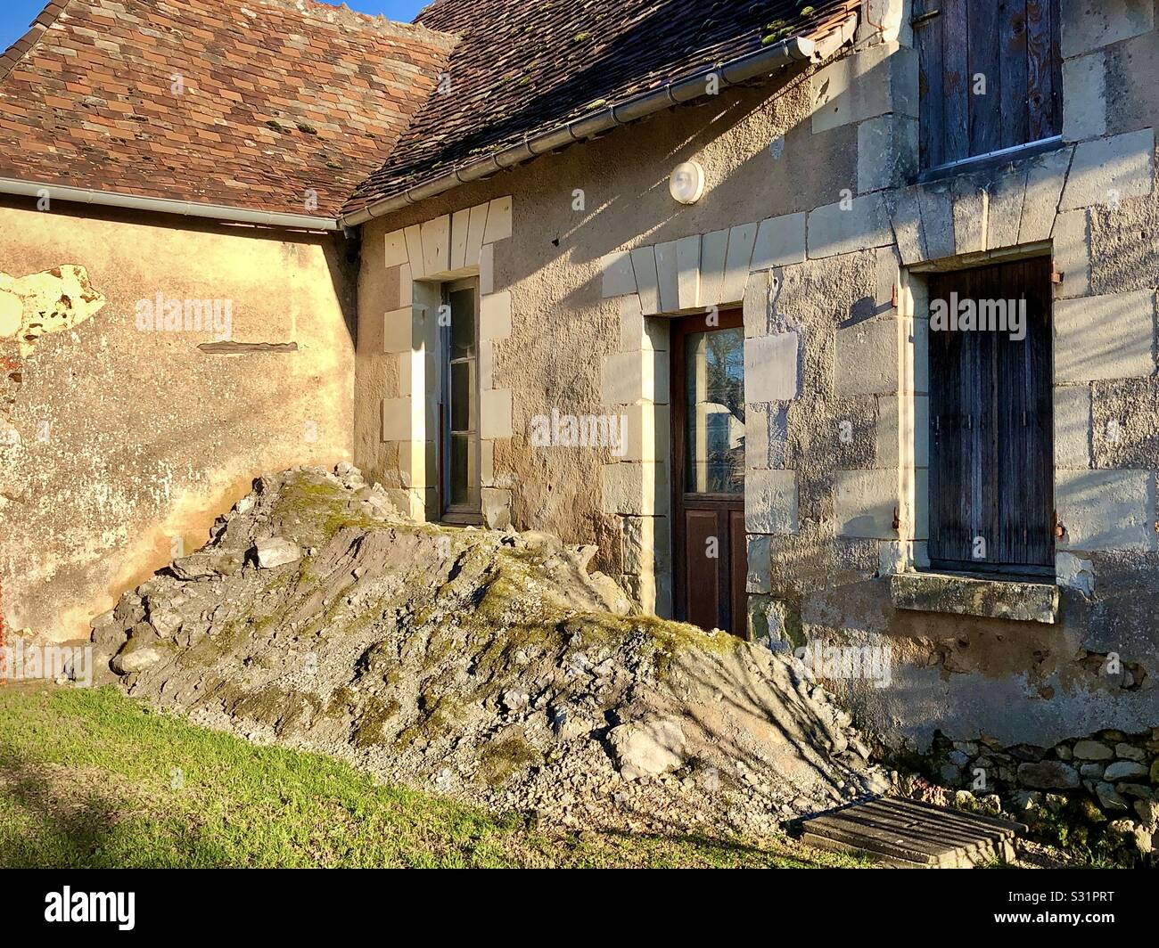 Builder’s rubble dumped on the doorstep! - Smartphone Captured Stock Image