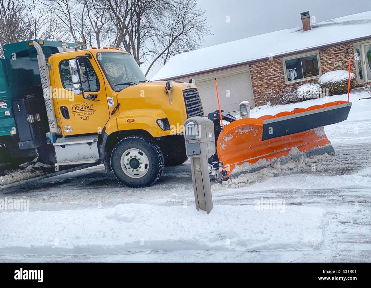 Dubuque, Iowa, 01/11/19landscape photo of yellow City snow plow