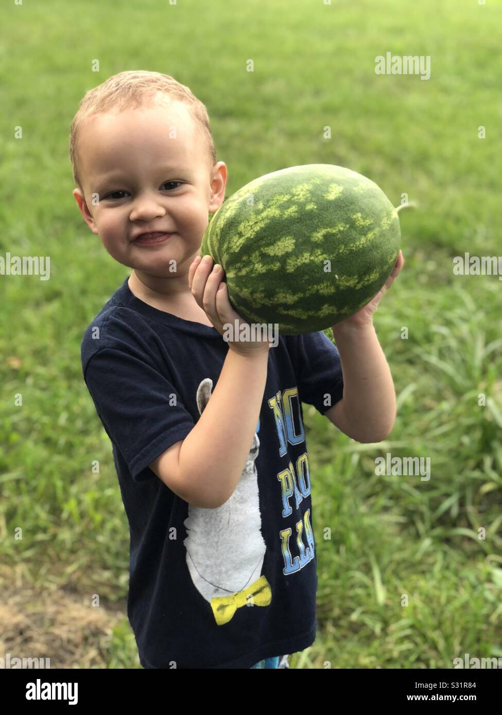 Kid with watermelon Stock Photo Alamy
