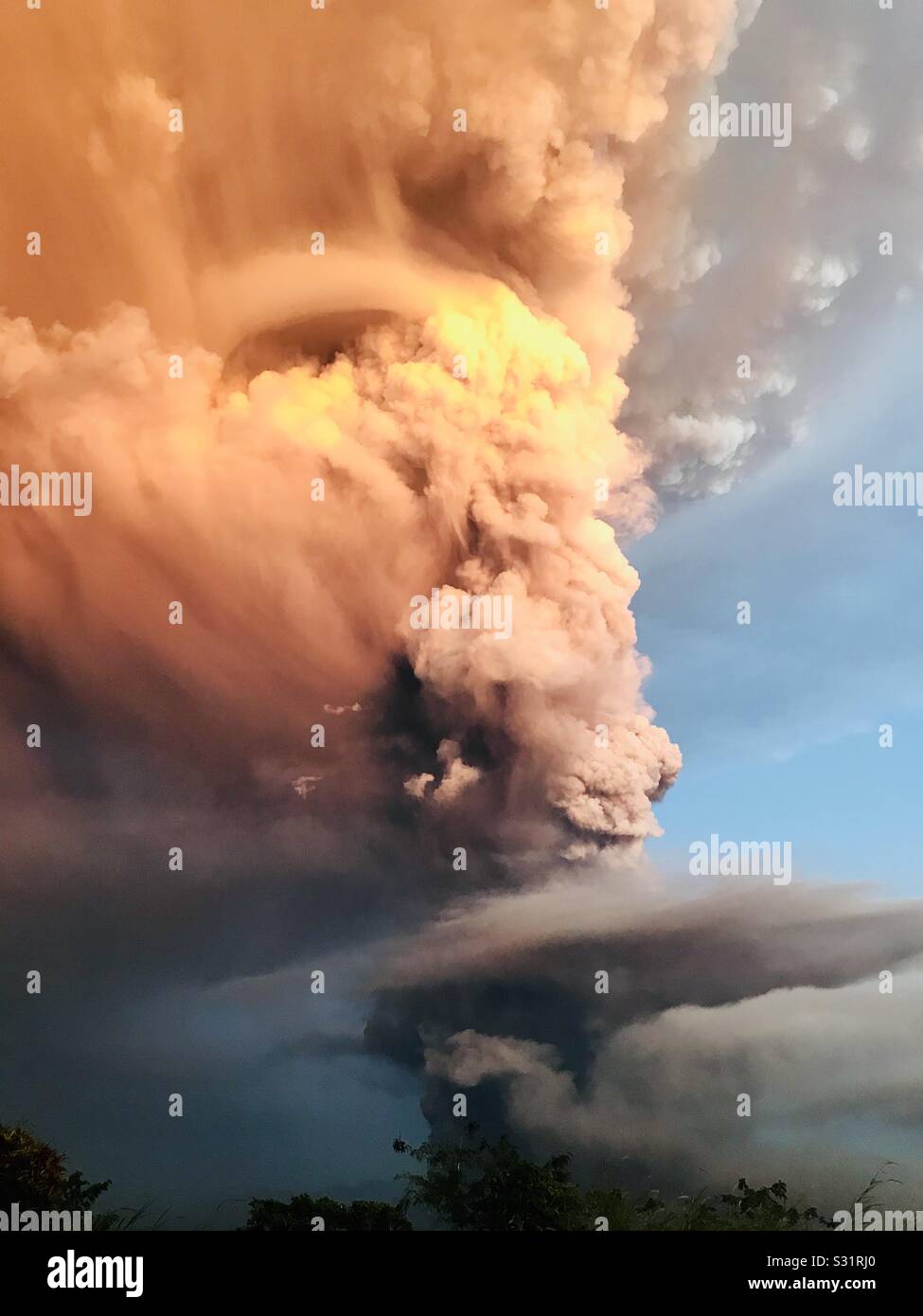 Latest news! Various figures appear during the eruption of Taal Volcano in Batangas, Philippines. There were spews of ashes due to phreatic explosion reaches the sky. Residents of forced to evacuate. Stock Photo